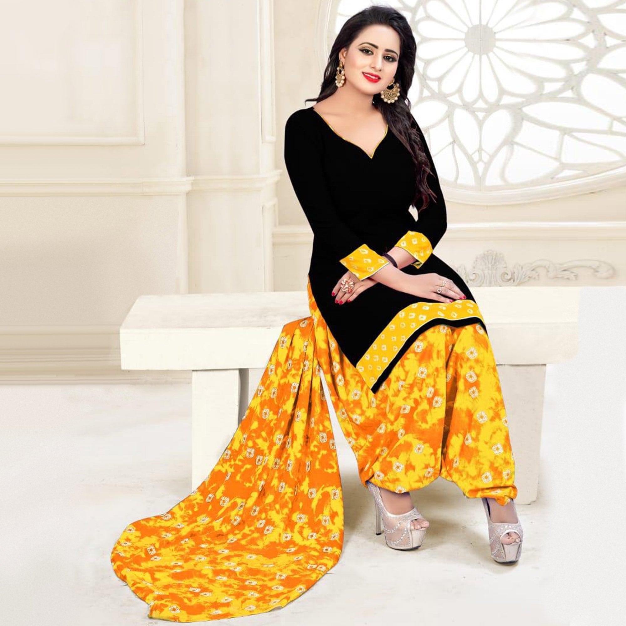 Classy Black - Orange Colored Casual Wear Printed Crepe Salwar Suit - Peachmode