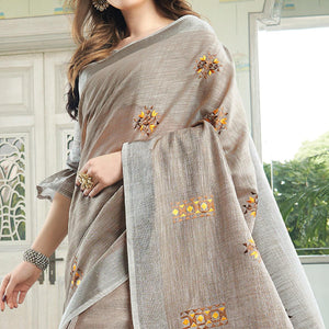 Classy Pastel Brown Colored Casual Wear Floral Embroidered Linen-Cotton Saree With Tassels - Peachmode