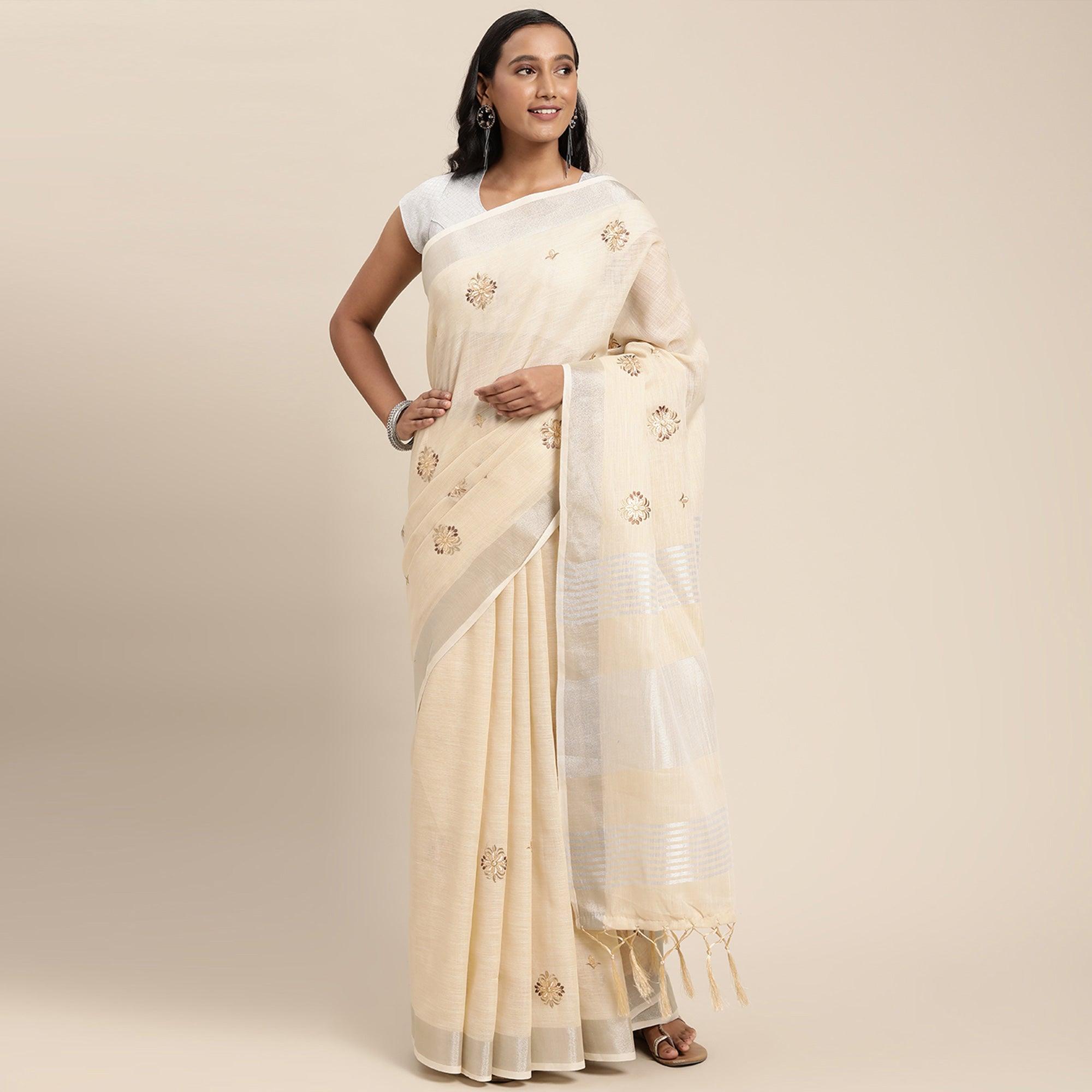 Cream Embroidered Linen Saree with Tassels - Peachmode