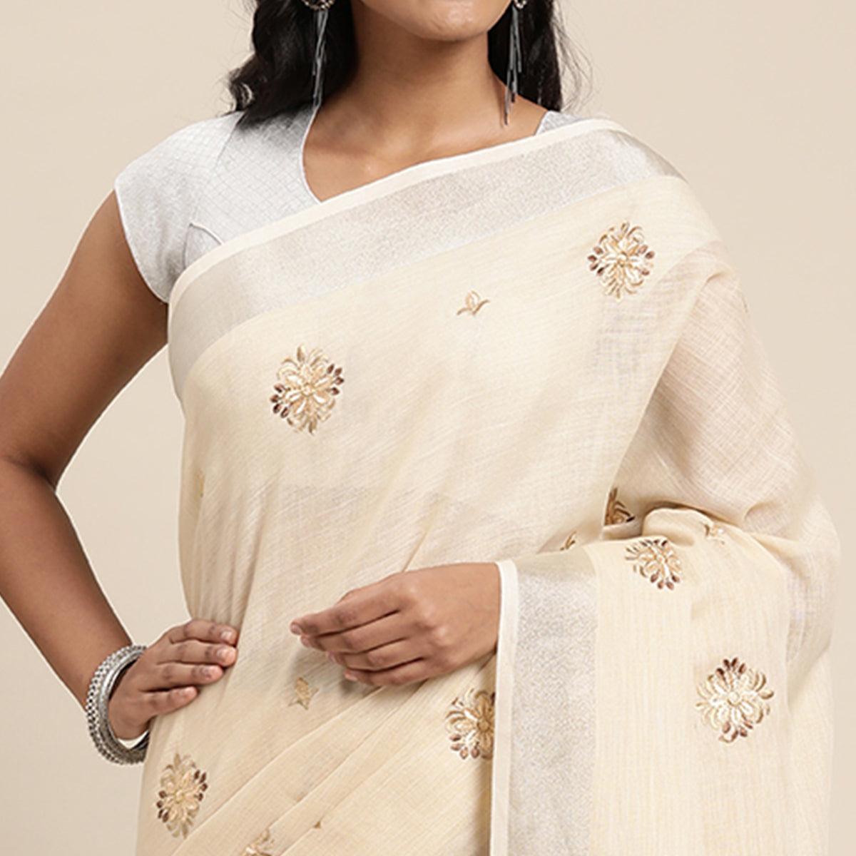 Cream Embroidered Linen Saree with Tassels - Peachmode