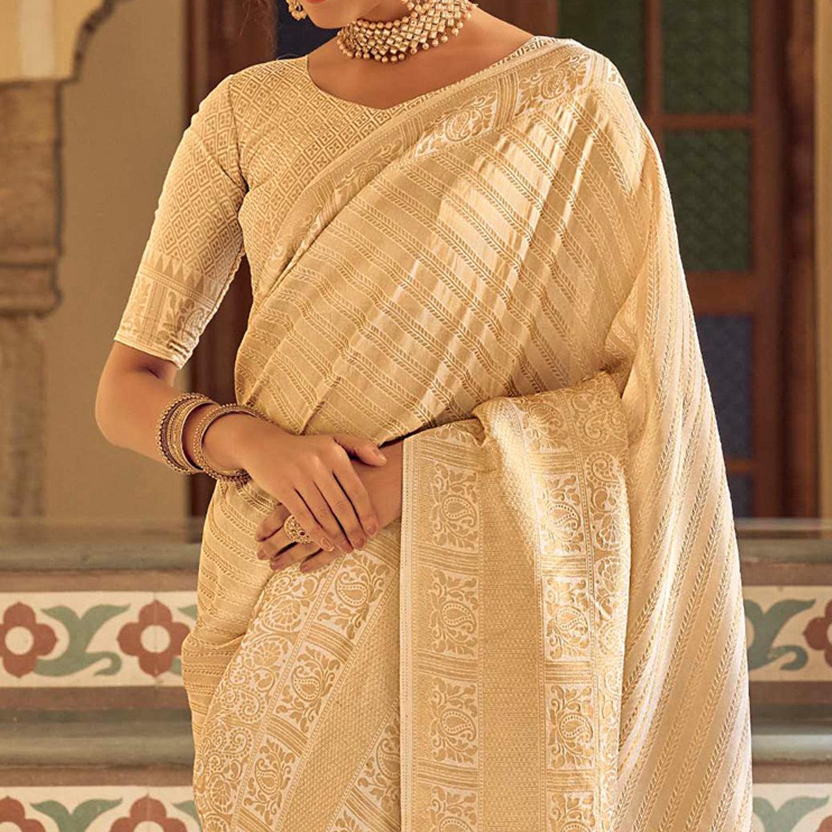 Cream Festive Wear Kanjivaram Blended Silk Saree With Tassels - Peachmode