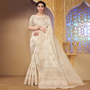 Cream Festive Wear Woven Raw Silk Saree - Peachmode