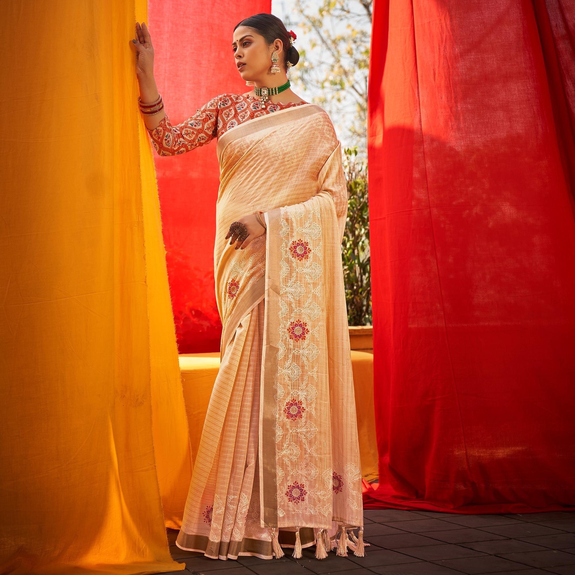 Cream Floral Embroidered Linen Saree - Peachmode