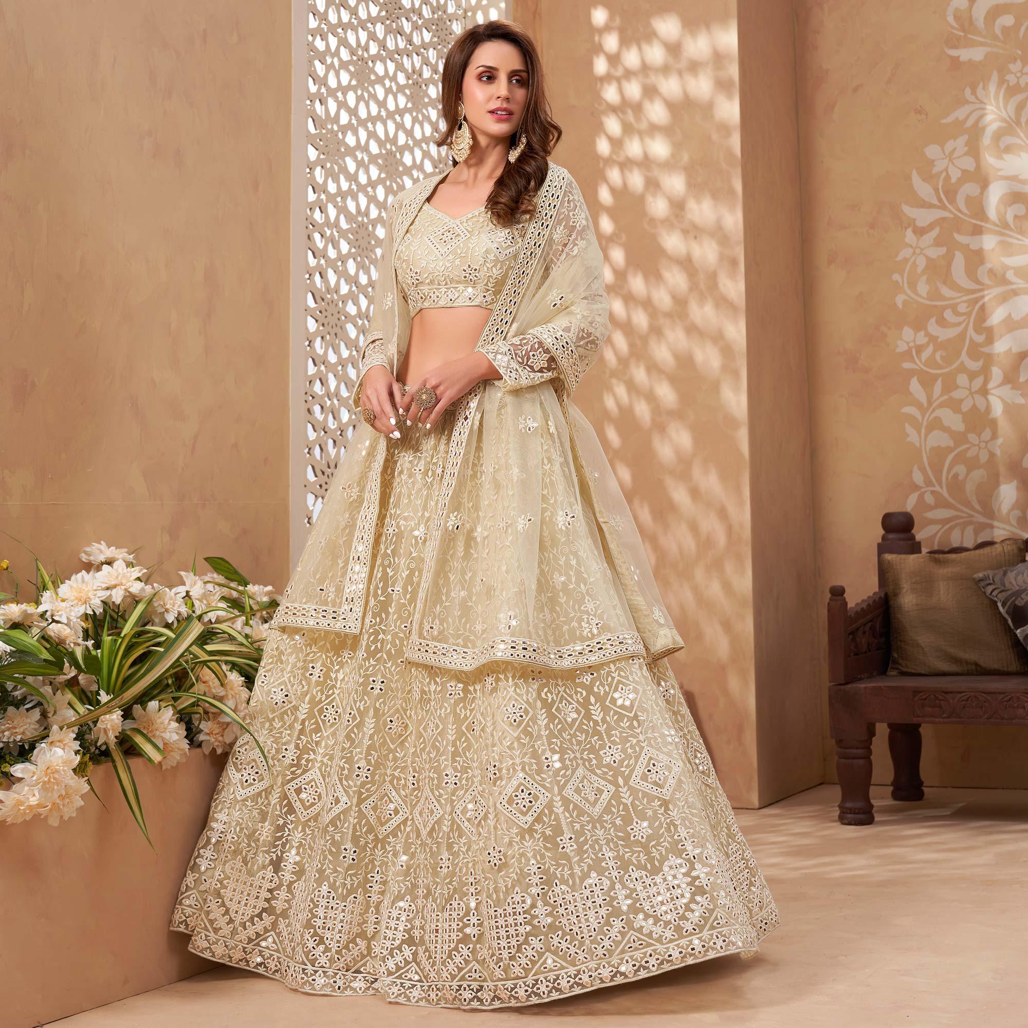 Cream Floral Embroidered Net Lehenga Choli - Peachmode