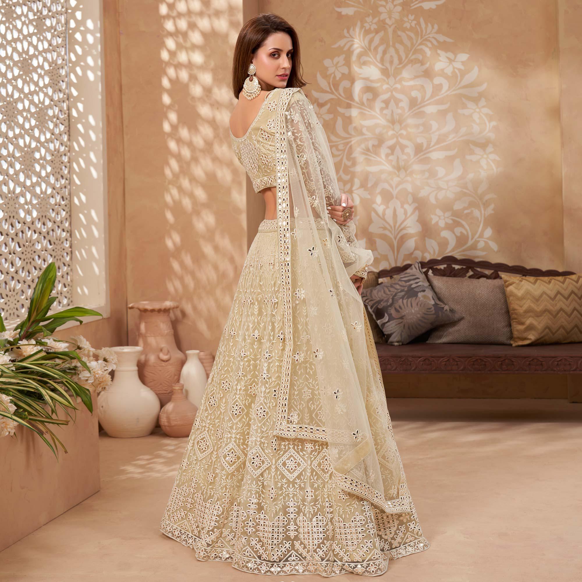 Cream Floral Embroidered Net Lehenga Choli - Peachmode