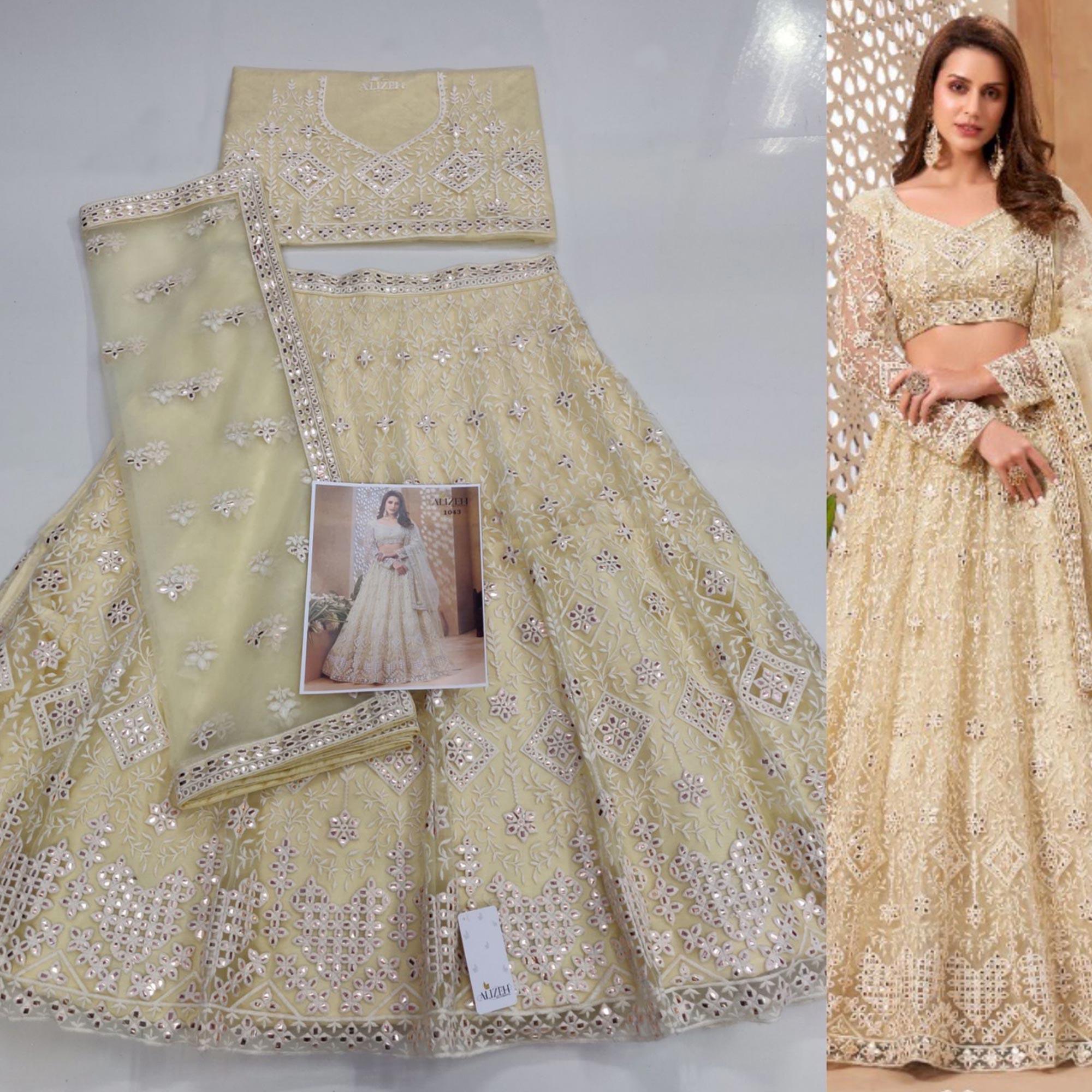 Cream Floral Embroidered Net Lehenga Choli - Peachmode