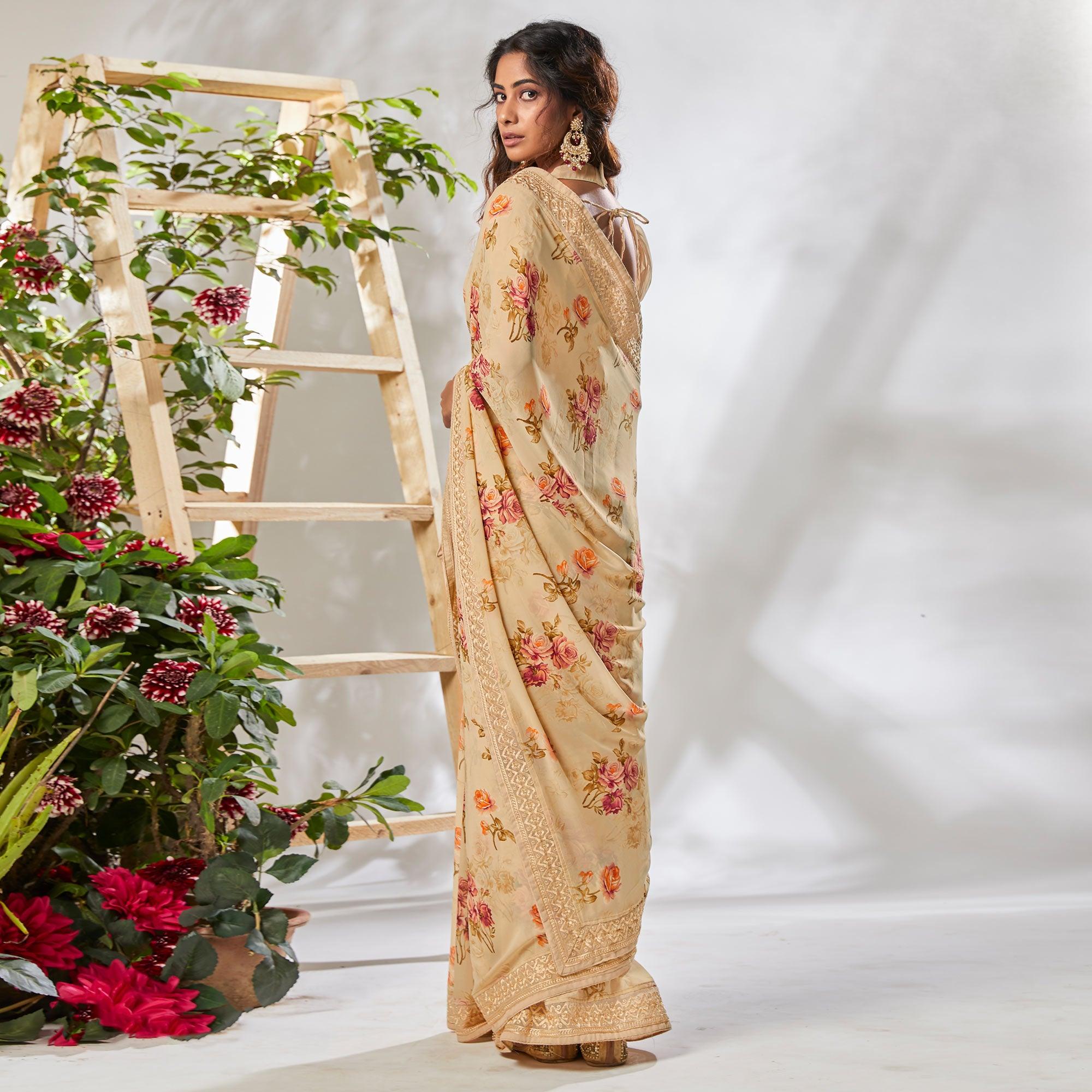Cream Floral Printed With Embroidered Border Georgette Saree - Peachmode