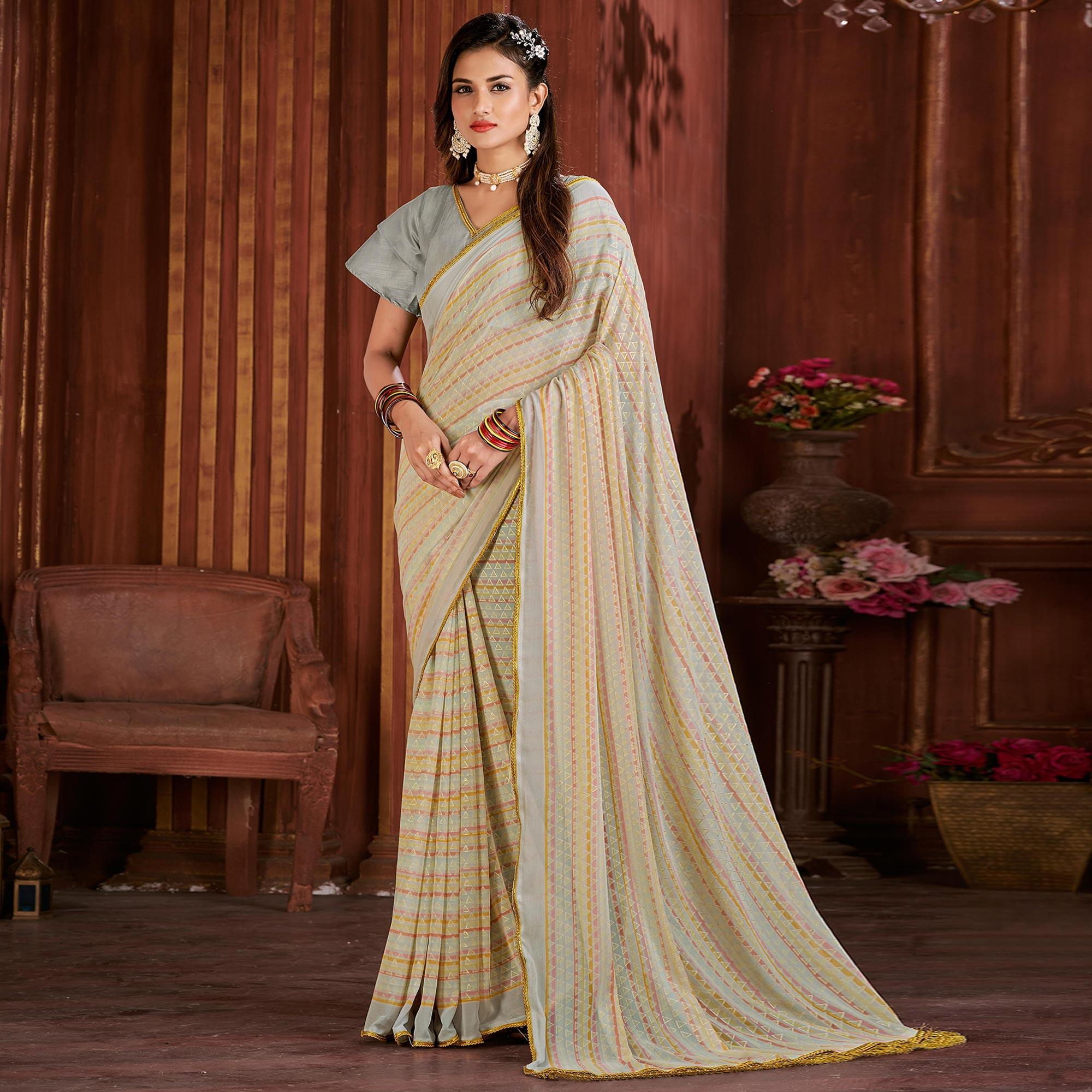 Cream Foil Printed Georgette Saree - Peachmode