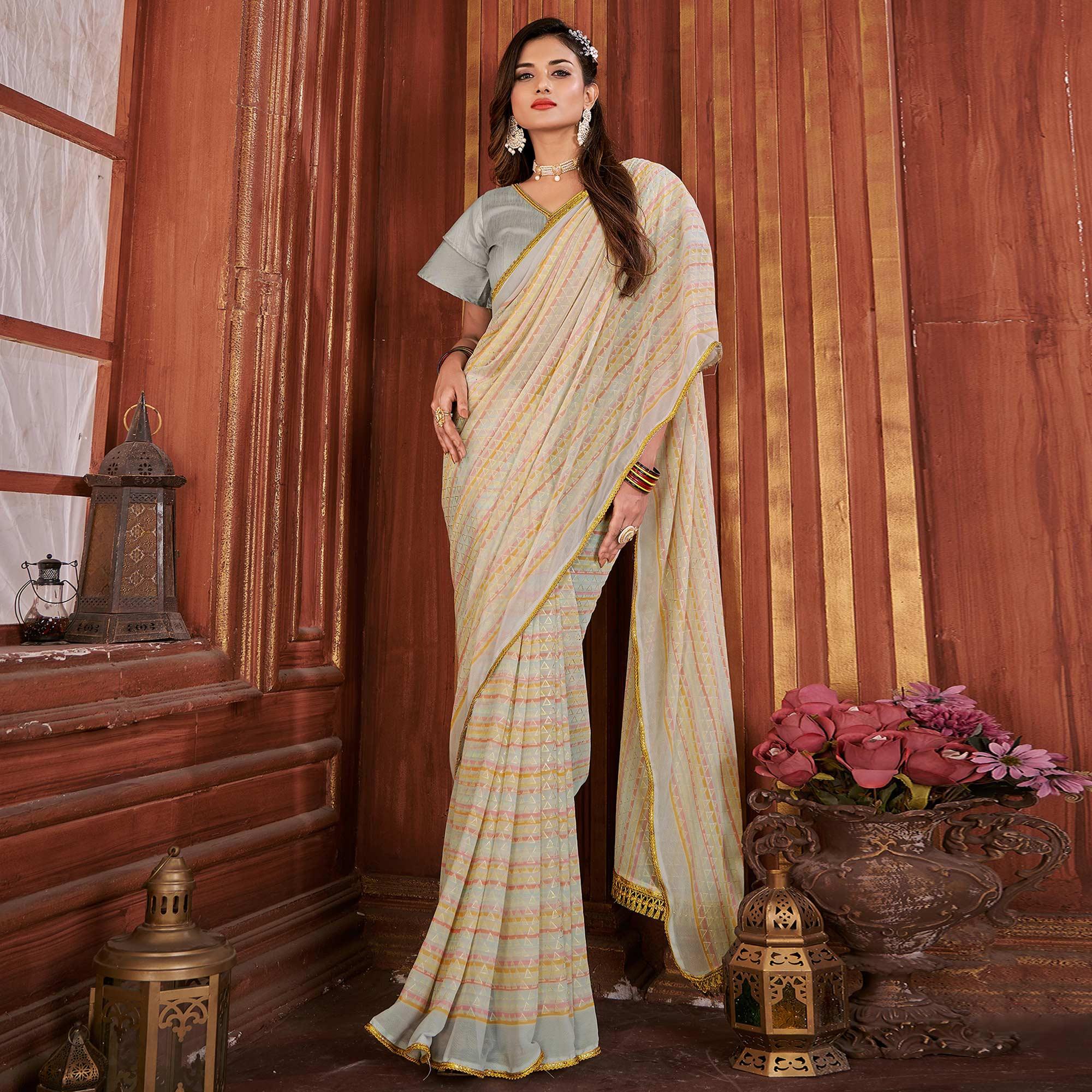 Cream Foil Printed Georgette Saree - Peachmode