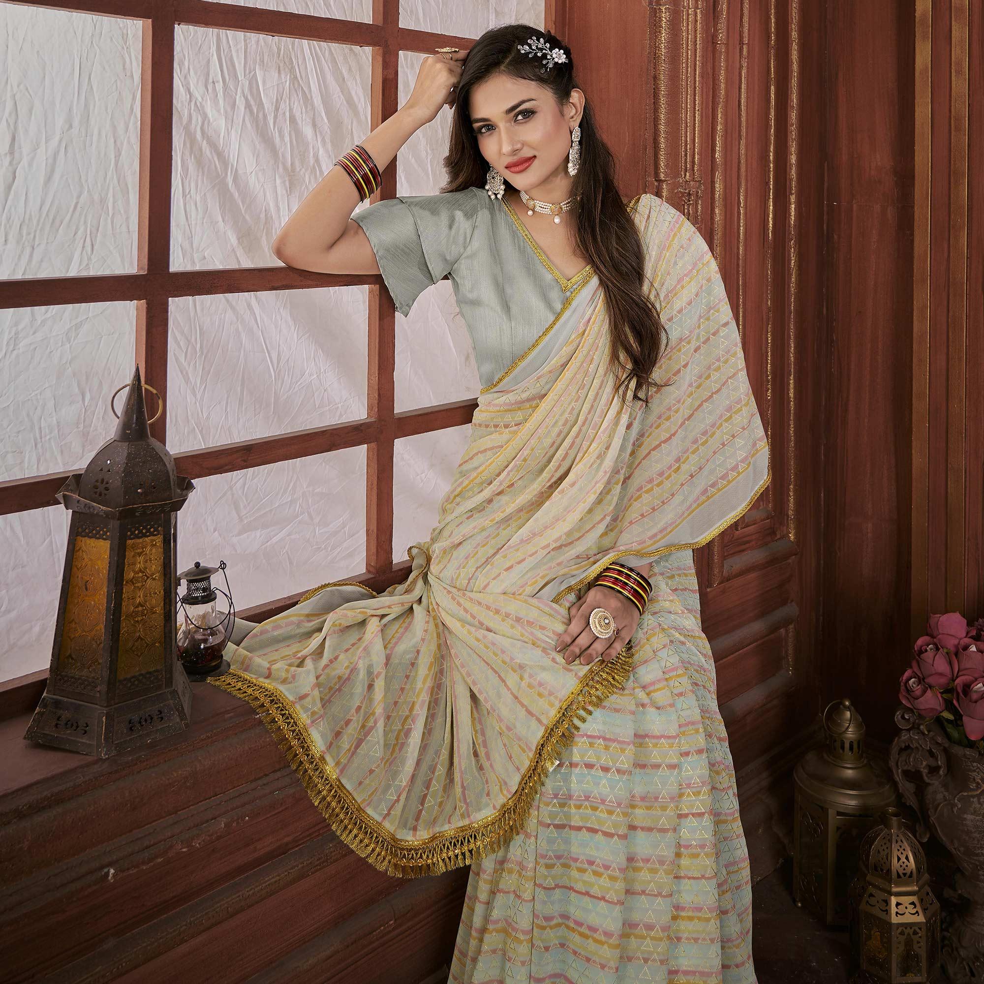Cream Foil Printed Georgette Saree - Peachmode