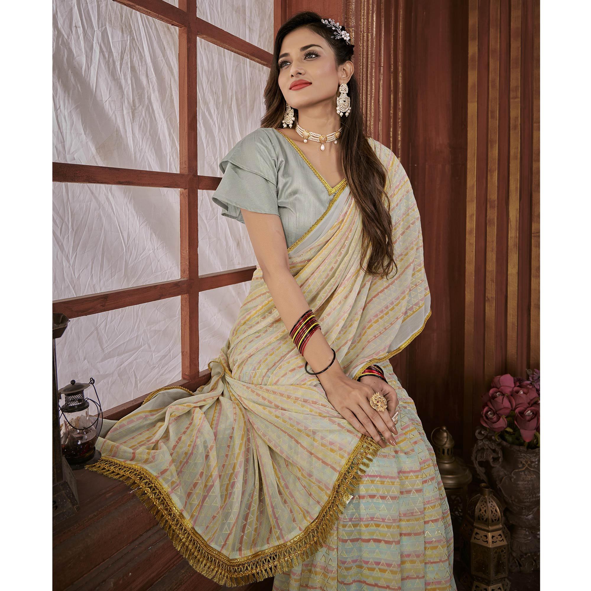 Cream Foil Printed Georgette Saree - Peachmode