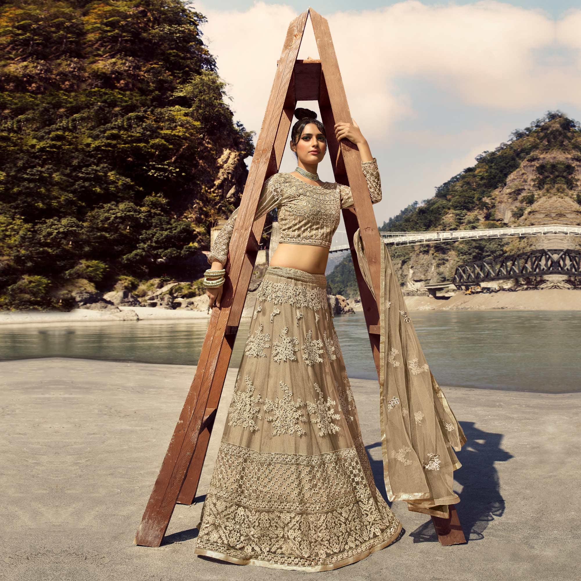 Cream Partywear Floral Heavy Embroidered Net Lehenga Choli - Peachmode