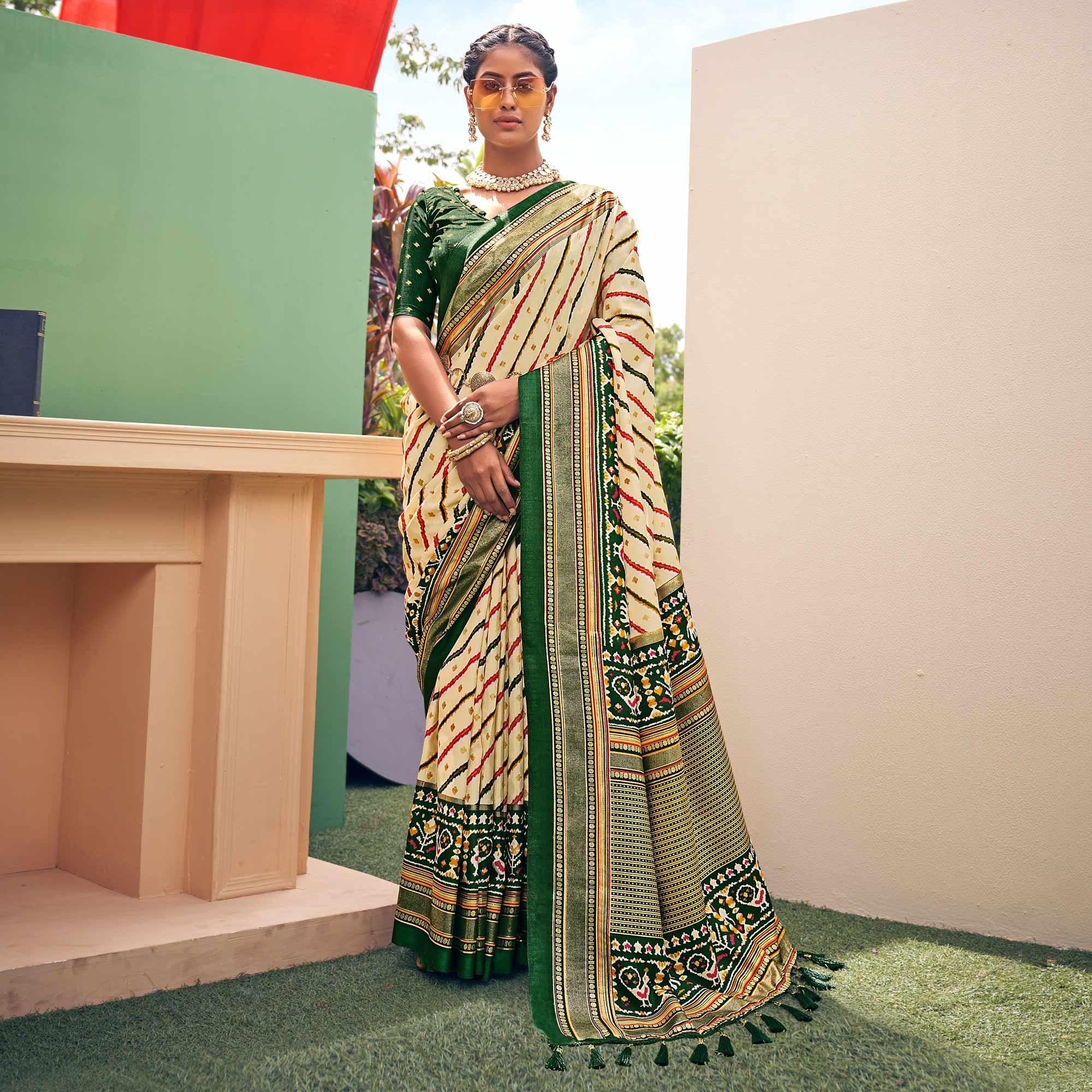 Cream Patola Printed Silk Saree With Tassels - Peachmode