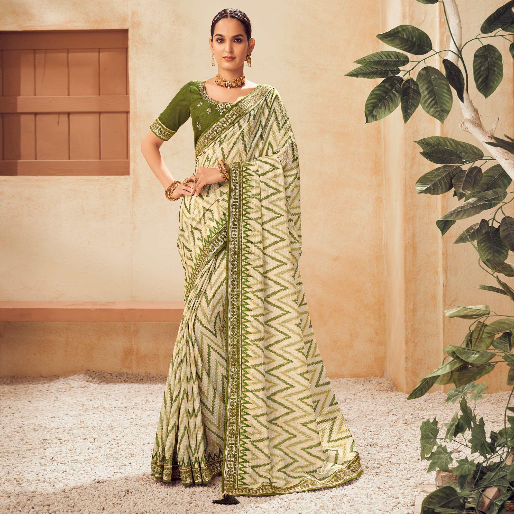 Cream Printed With Embellished Chiffon Saree With Tassels - Peachmode