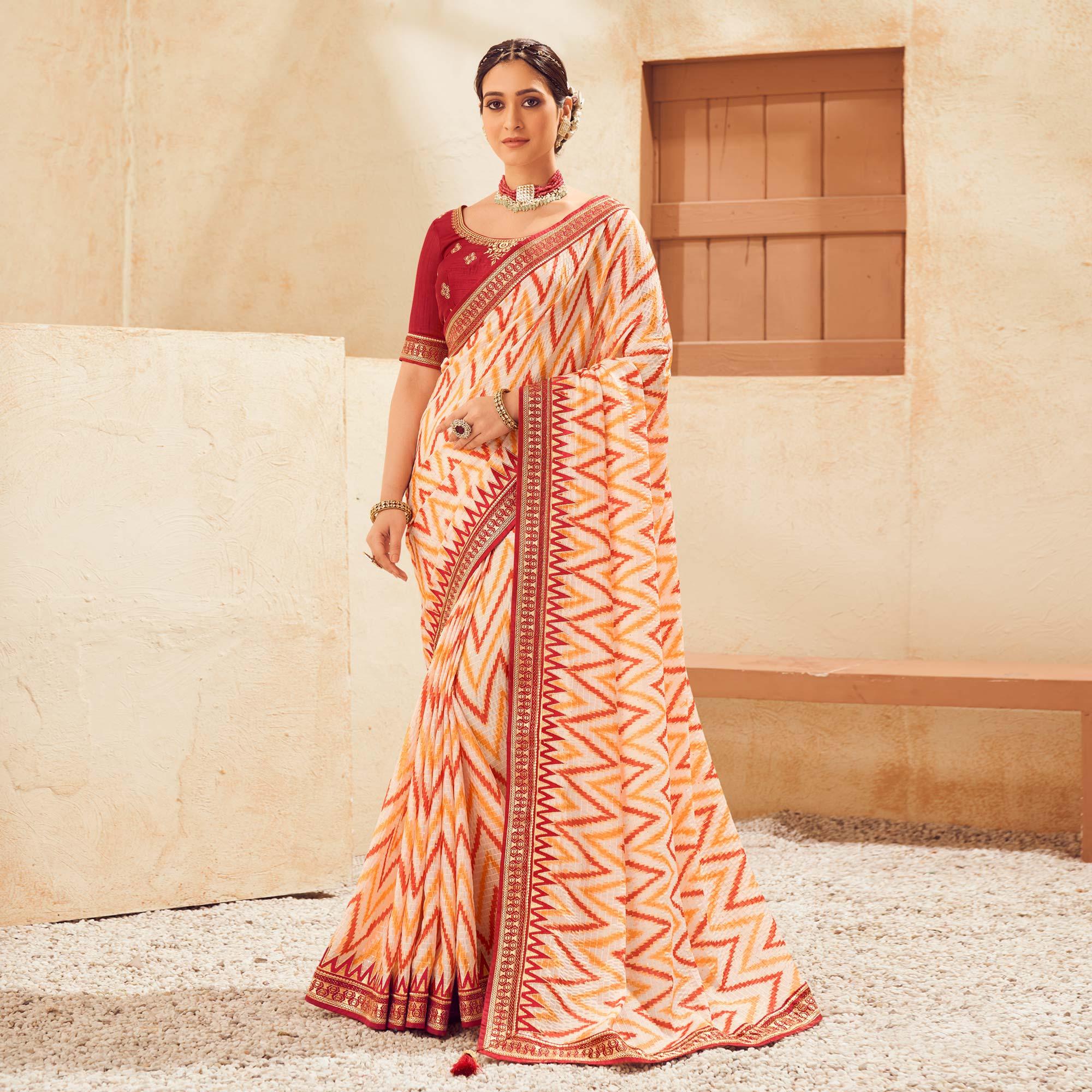 Cream Printed With Embellished Chiffon Saree With Tassels - Peachmode