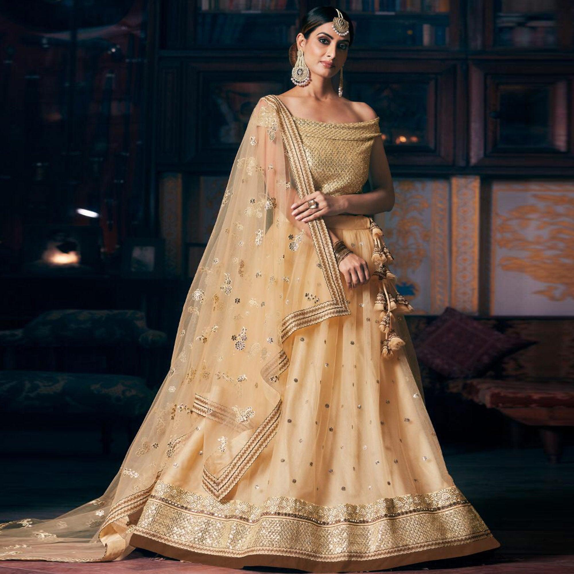 Cream Wedding Wear Floral Embroidery With Sequence And Dori Work Net Lehenga Choli - Peachmode