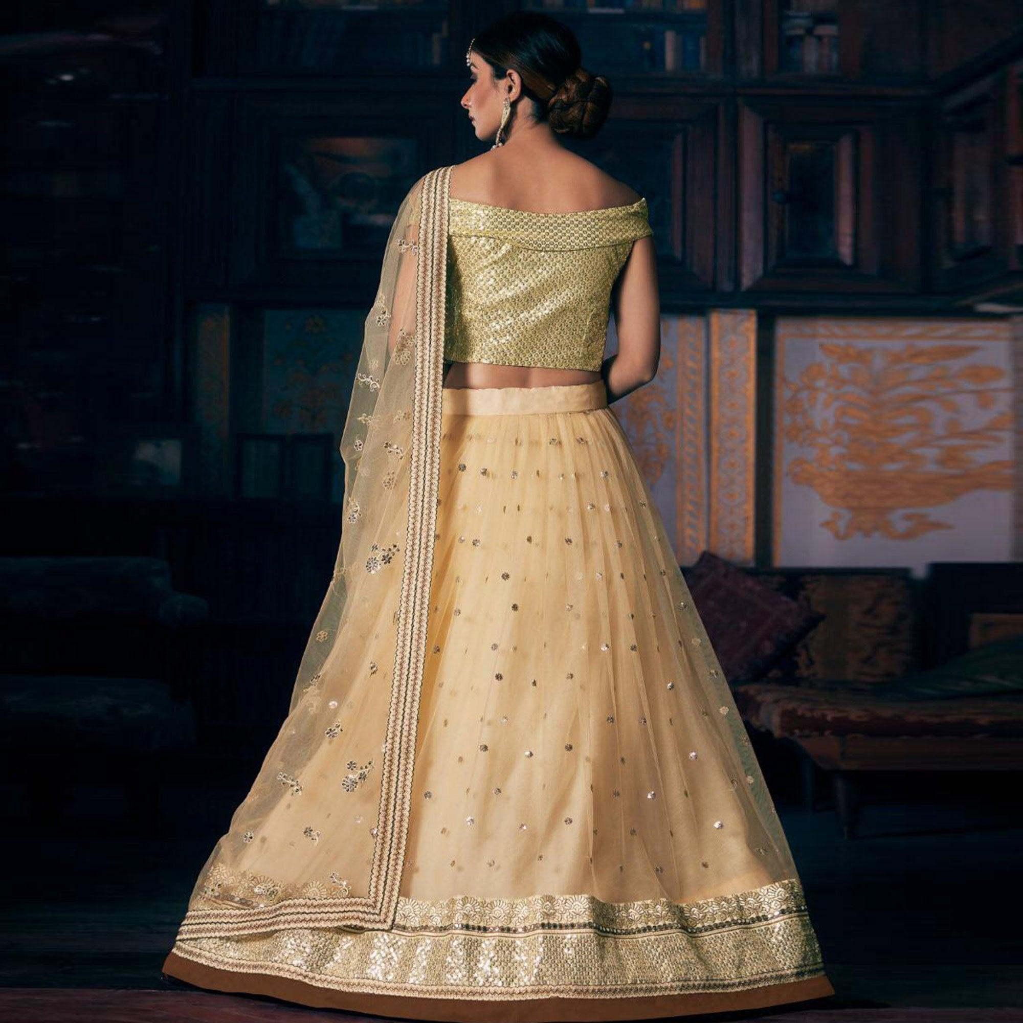 Cream Wedding Wear Floral Embroidery With Sequence And Dori Work Net Lehenga Choli - Peachmode