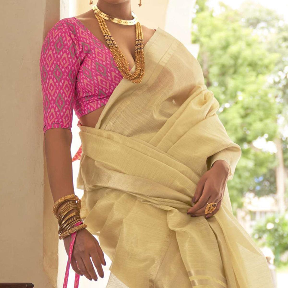 Cream Woven Organza Saree With Tassels - Peachmode