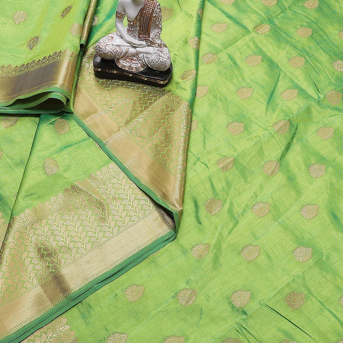 Dazzling Green Colored Festive Wear Woven Banarasi Silk Saree With Tassels - Peachmode