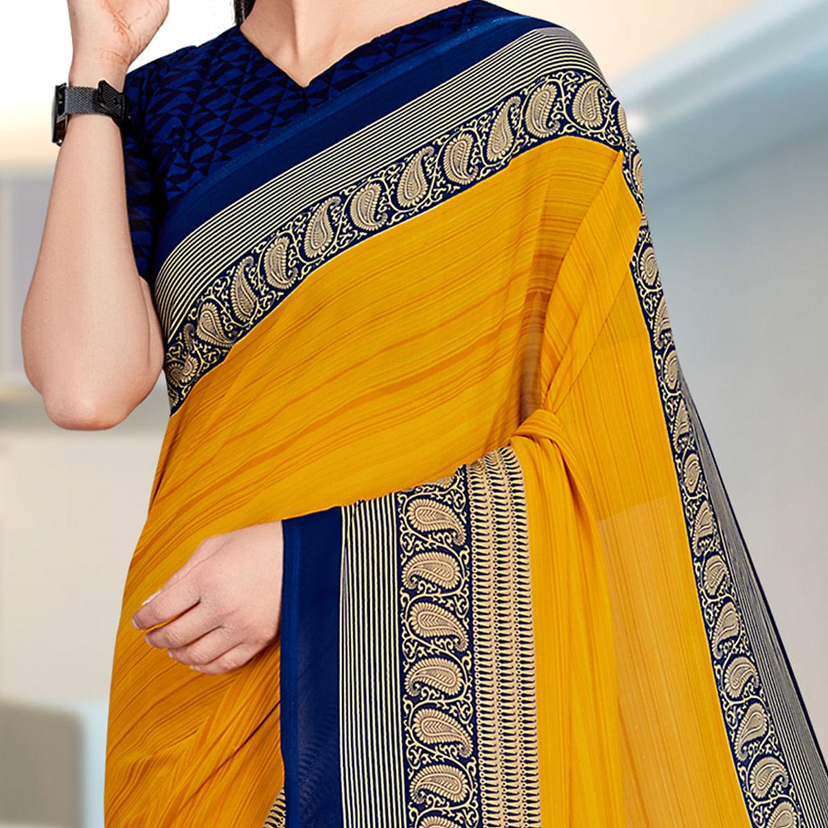 Dazzling Mustard Coloured Casual Wear Printed Georgette Saree - Peachmode