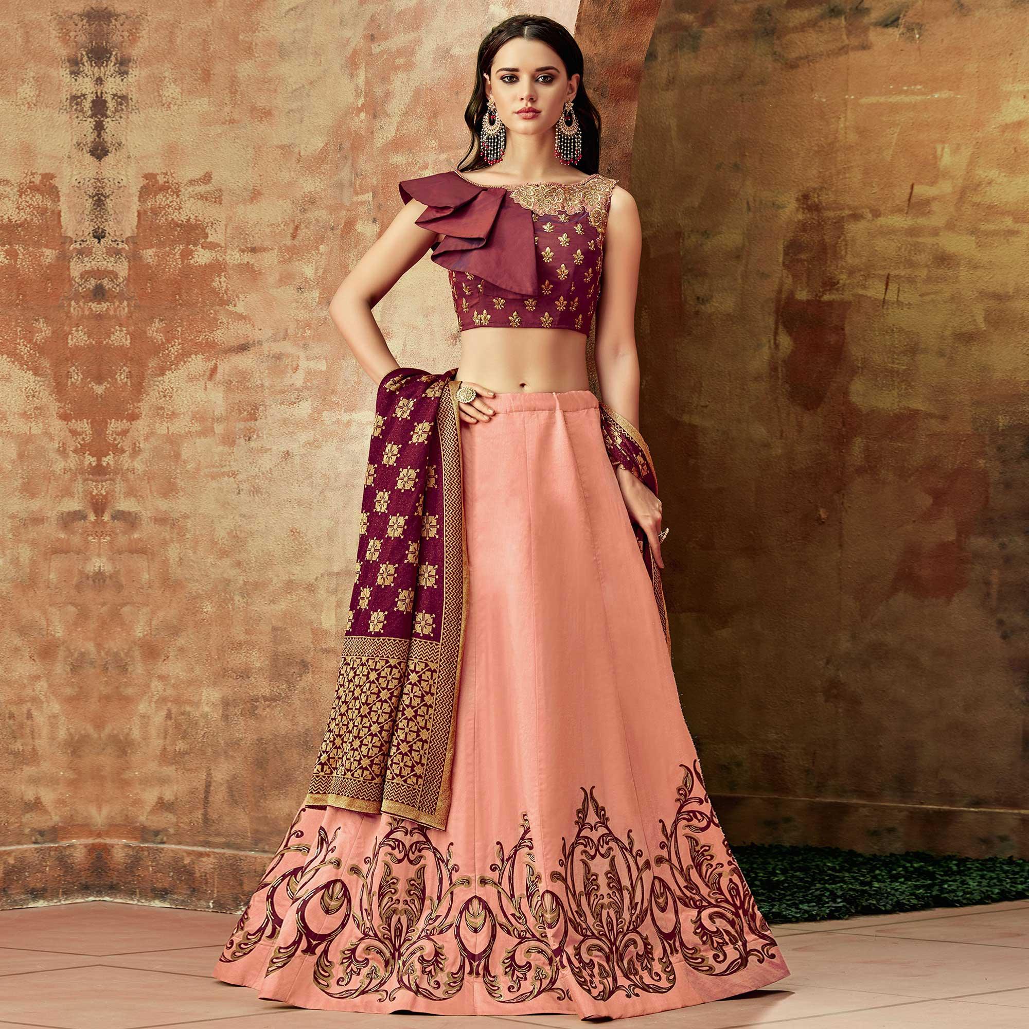 Dazzling Peach Colored Partywear Embroidered Silk Lehenga Choli - Peachmode