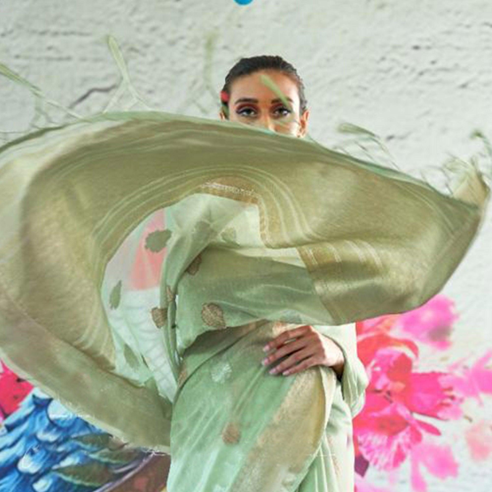 Dazzling Turquoise Coloured Partywear Organza weaving Saree - Peachmode