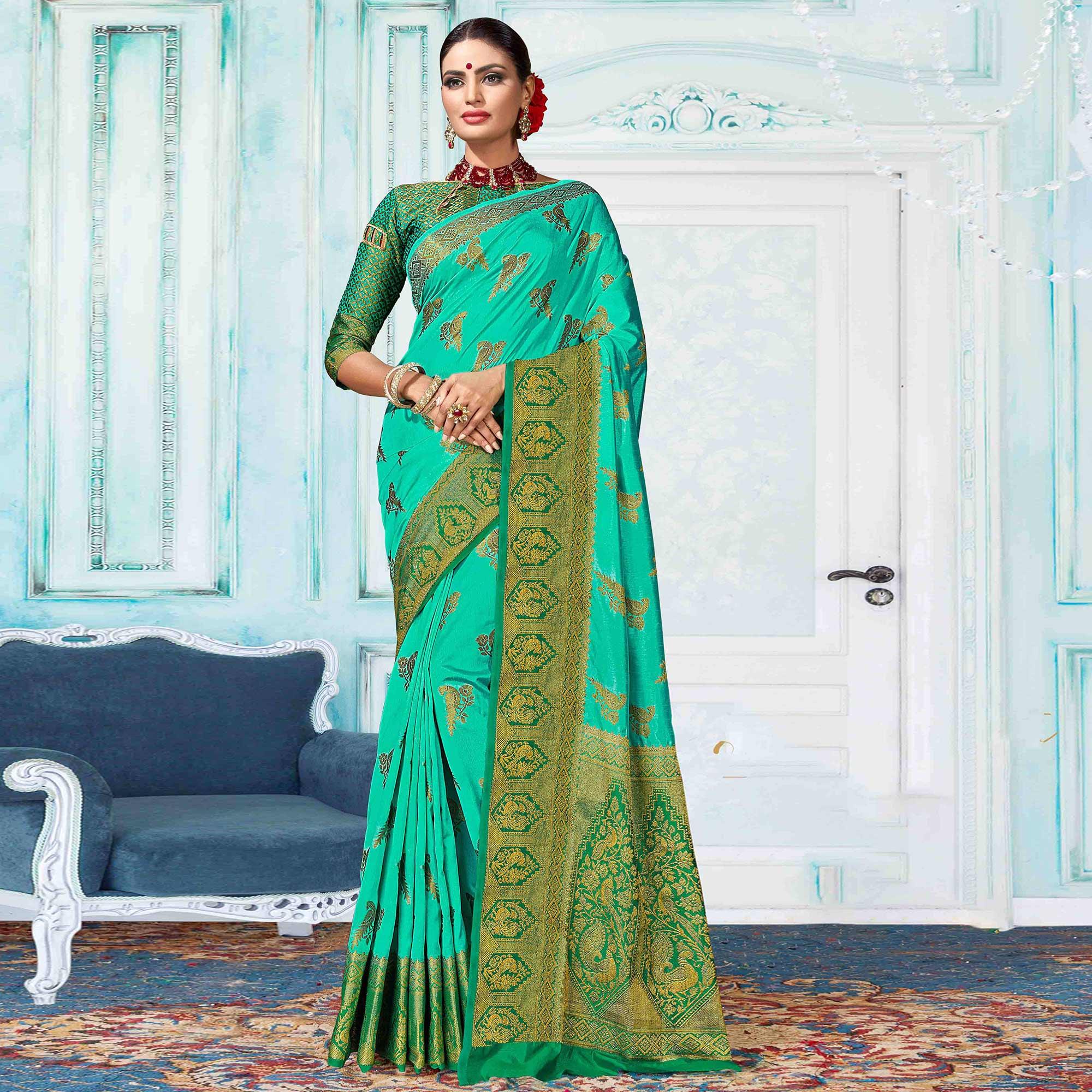 Dazzling Turquoise Green Colored Festive Wear Woven Nylon Silk Saree - Peachmode
