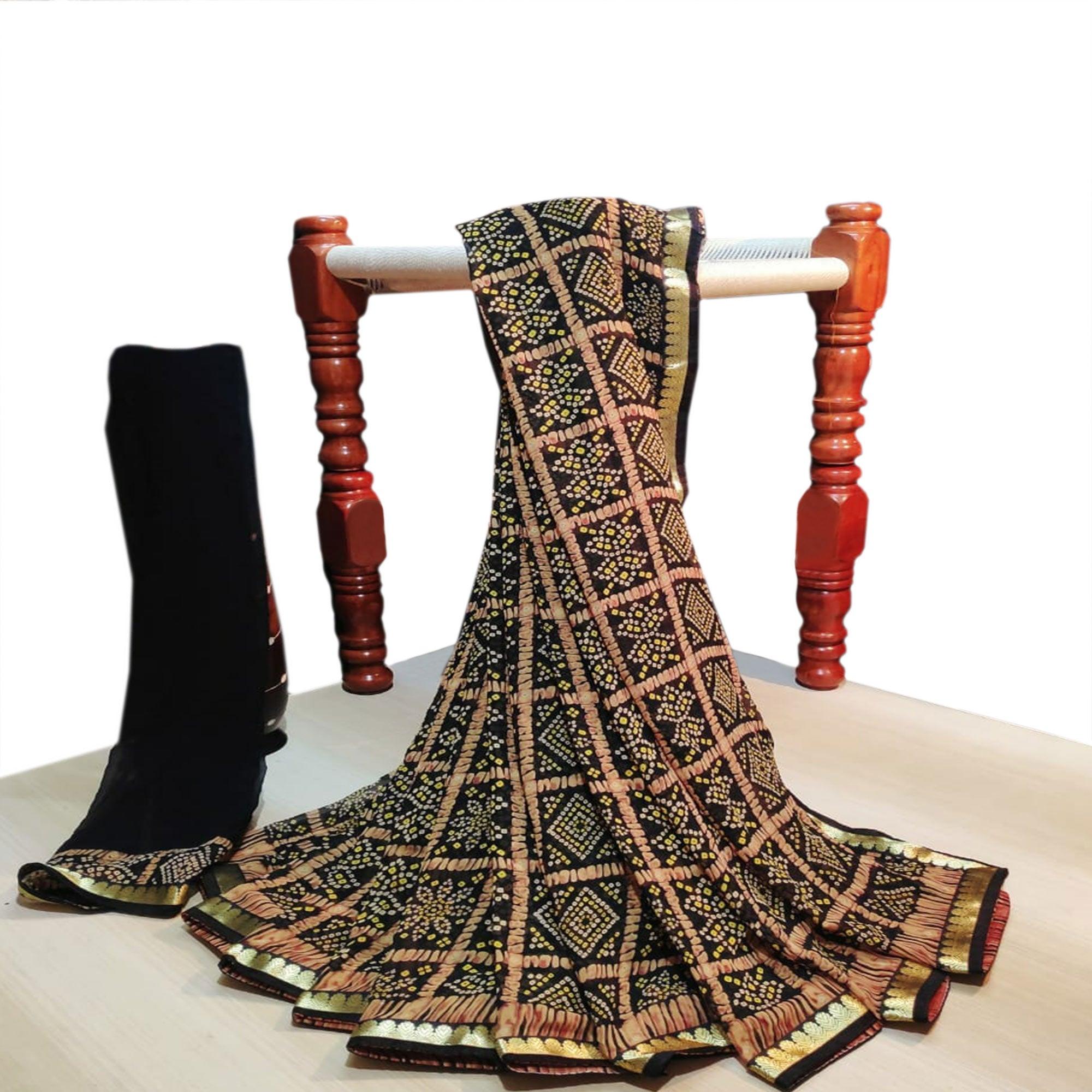Delightful Black Colored Casual Wear Bandhani Printed Georgette Saree - Peachmode