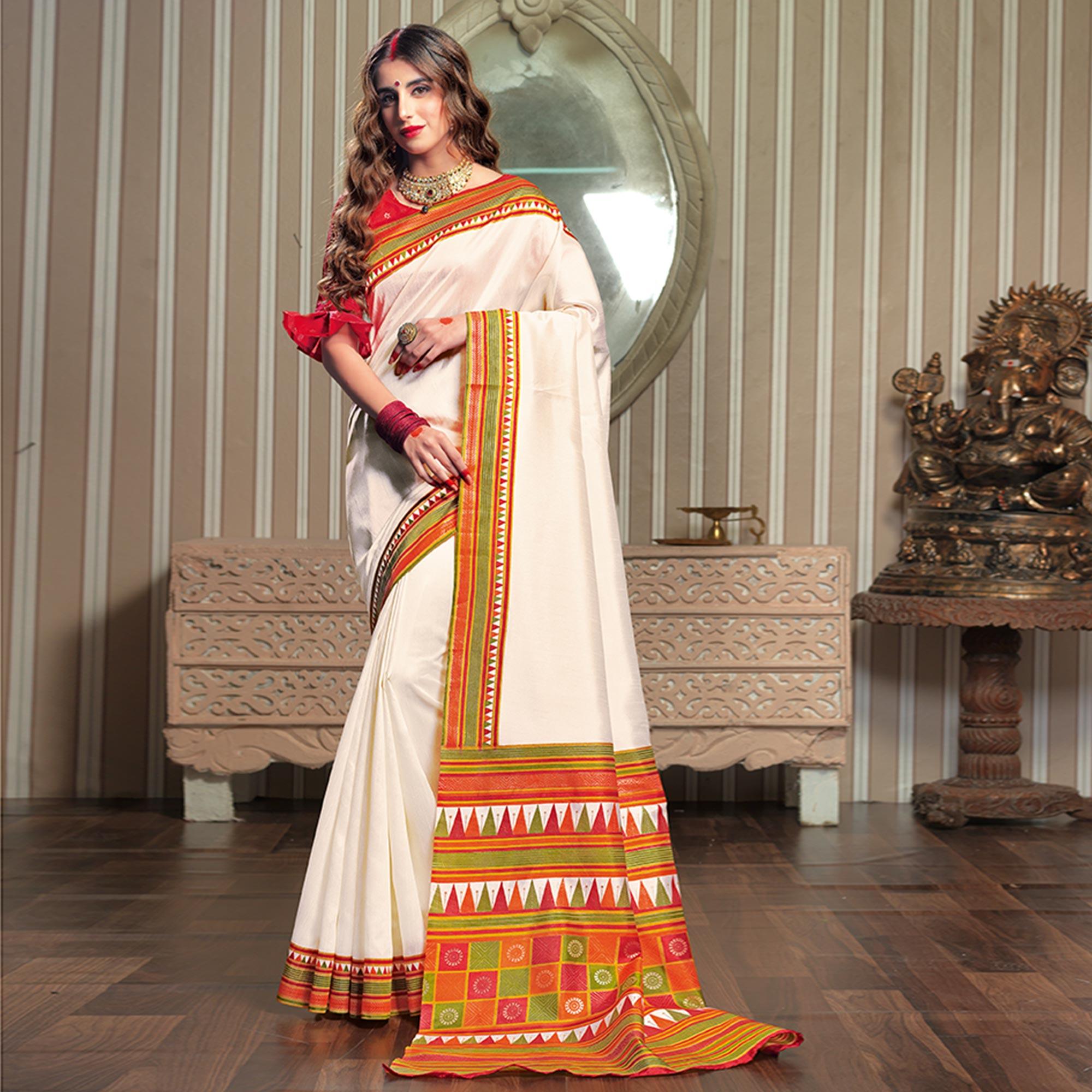 Delightful Cream Colored Festive Wear Patola Silk saree - Peachmode