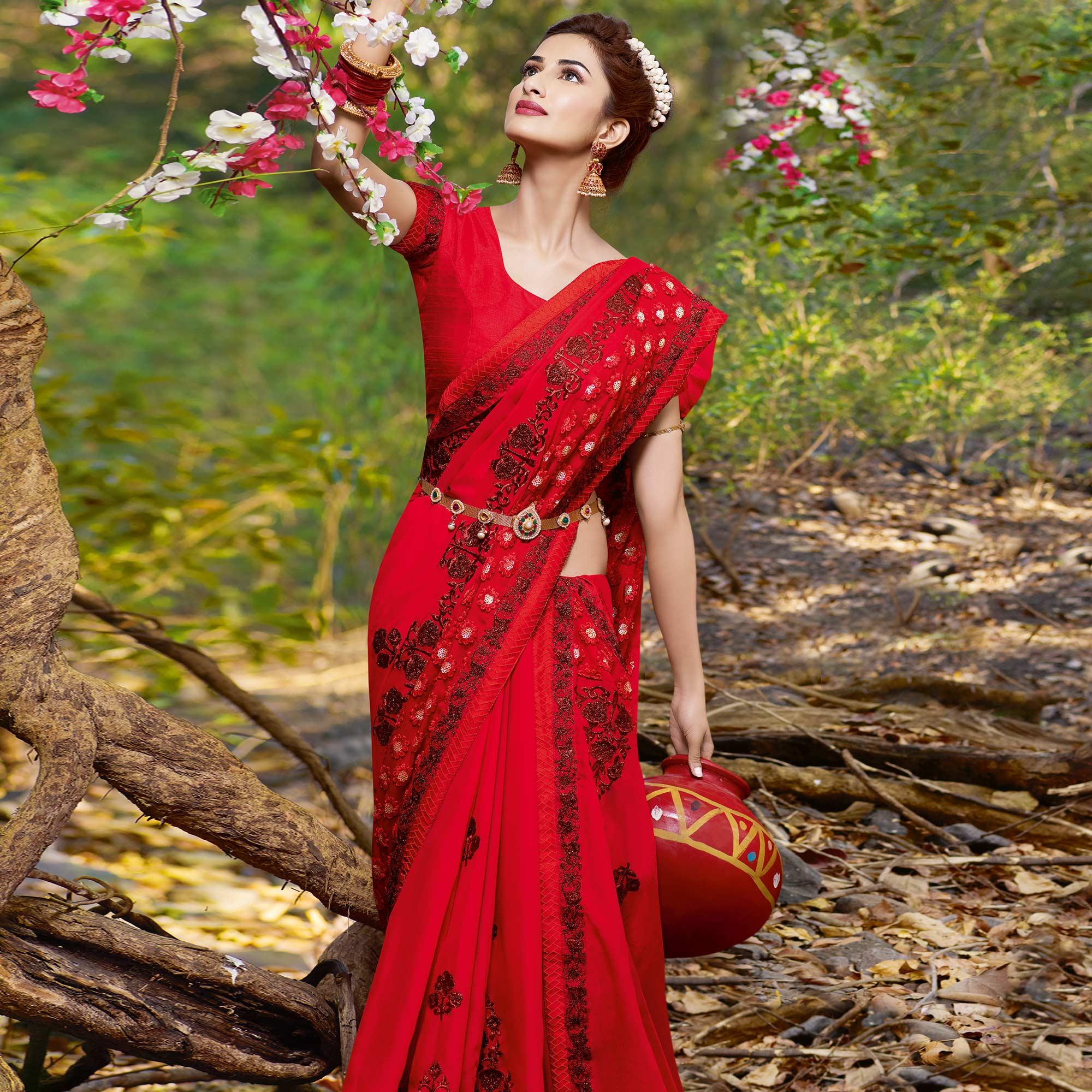 Delightful Red Colored Partywear Embroidered Georgette Saree - Peachmode