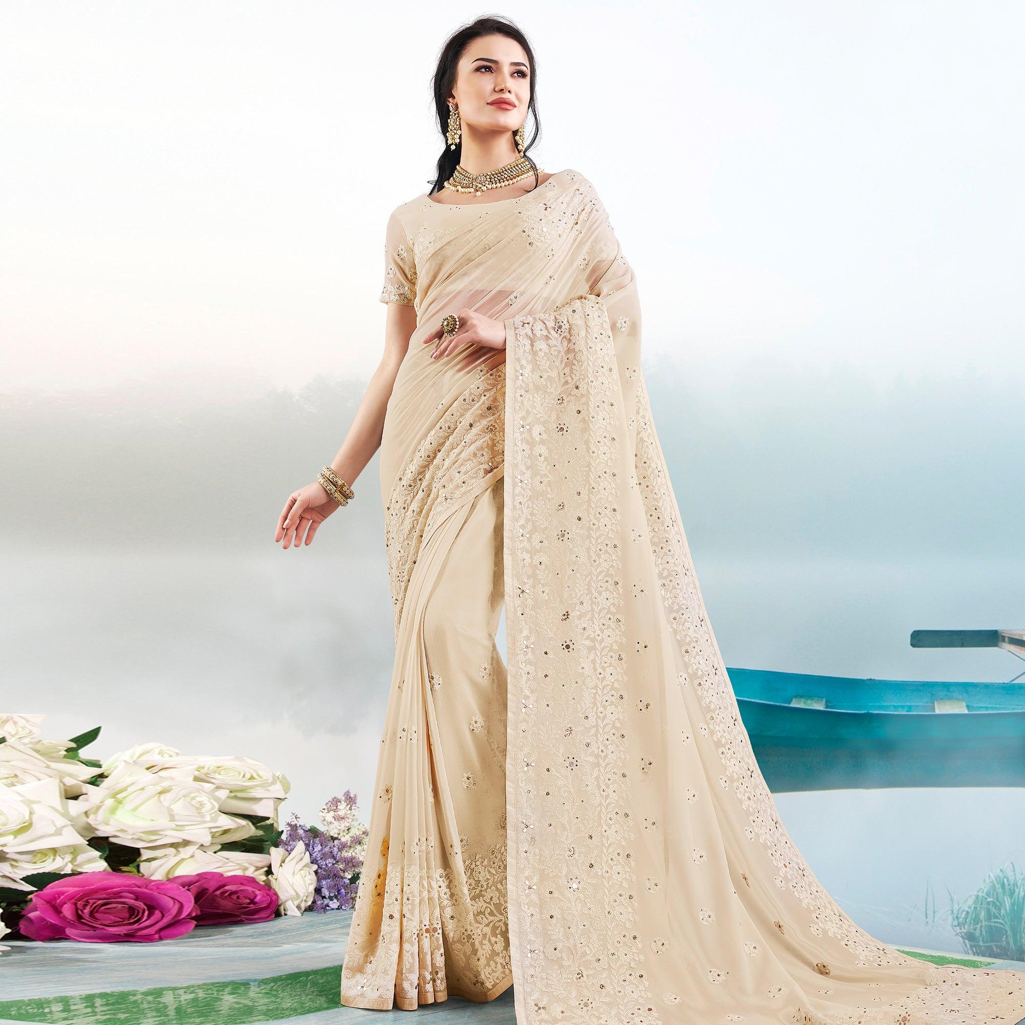 Demanding Beige Colored Partywear Embroidered Georgette Saree - Peachmode