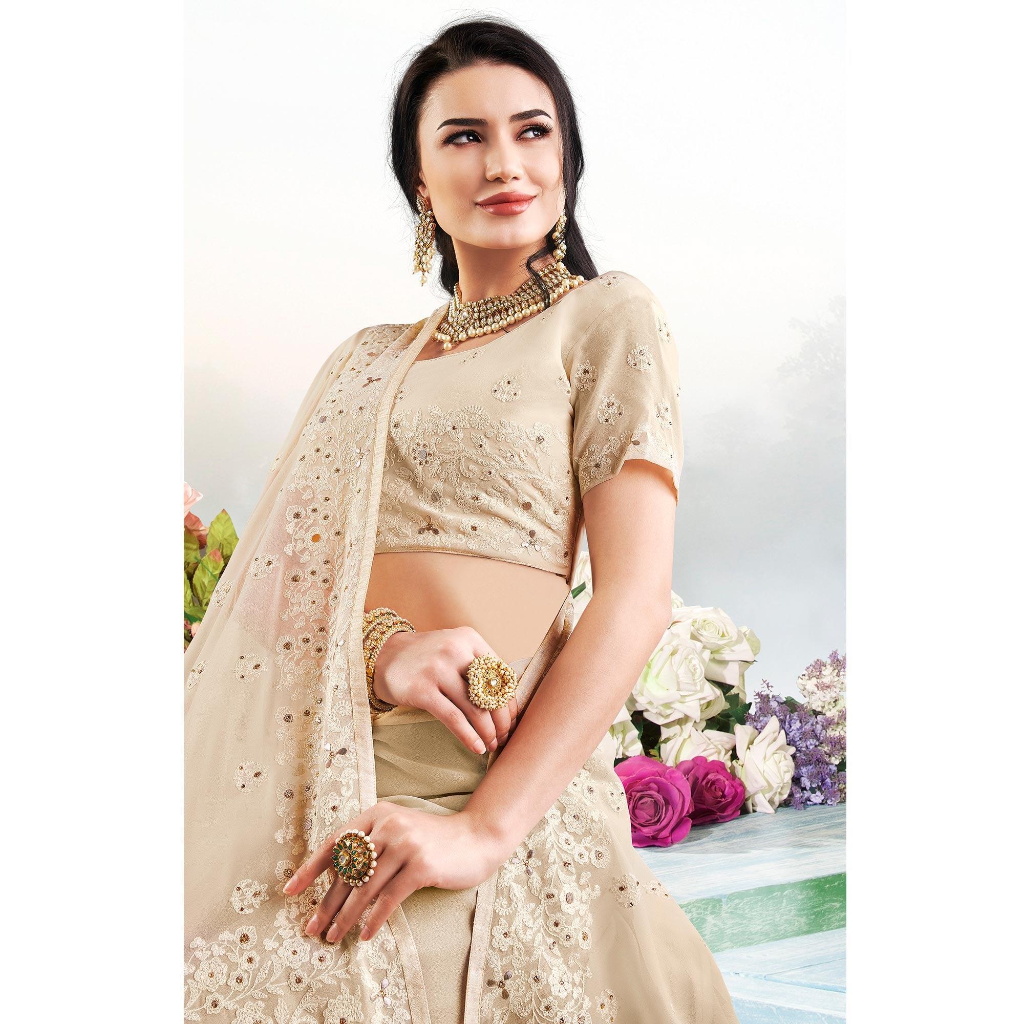 Demanding Beige Colored Partywear Embroidered Georgette Saree - Peachmode