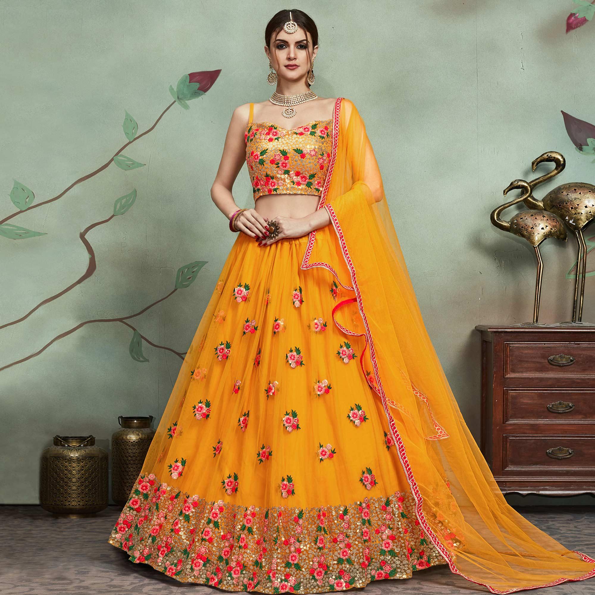 Demanding Mustard Yellow Colored Partywear Embroidered Netted Lehenga - Peachmode