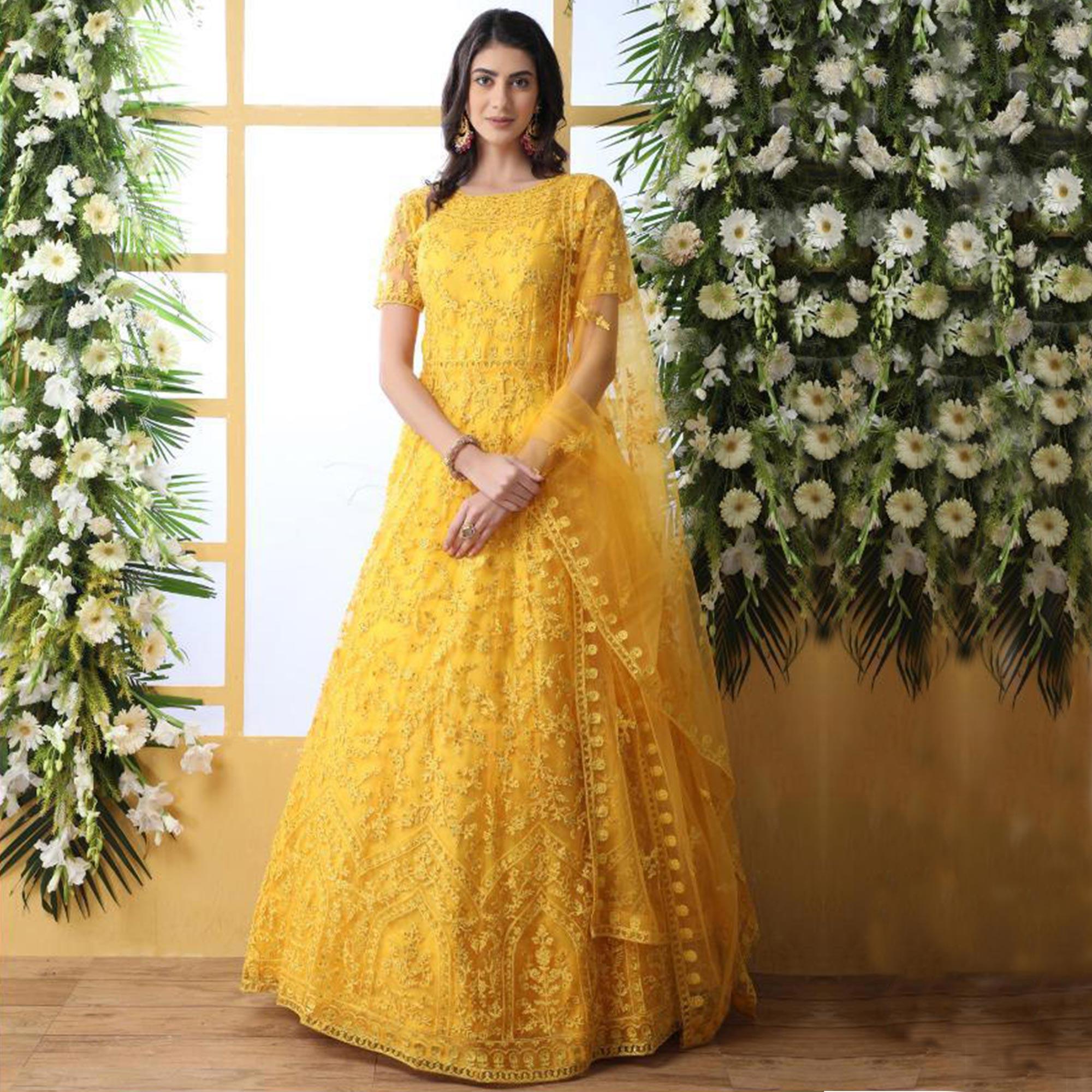 Demanding Yellow Colored Party Wear Embroidered Net Gown With Dupatta - Peachmode