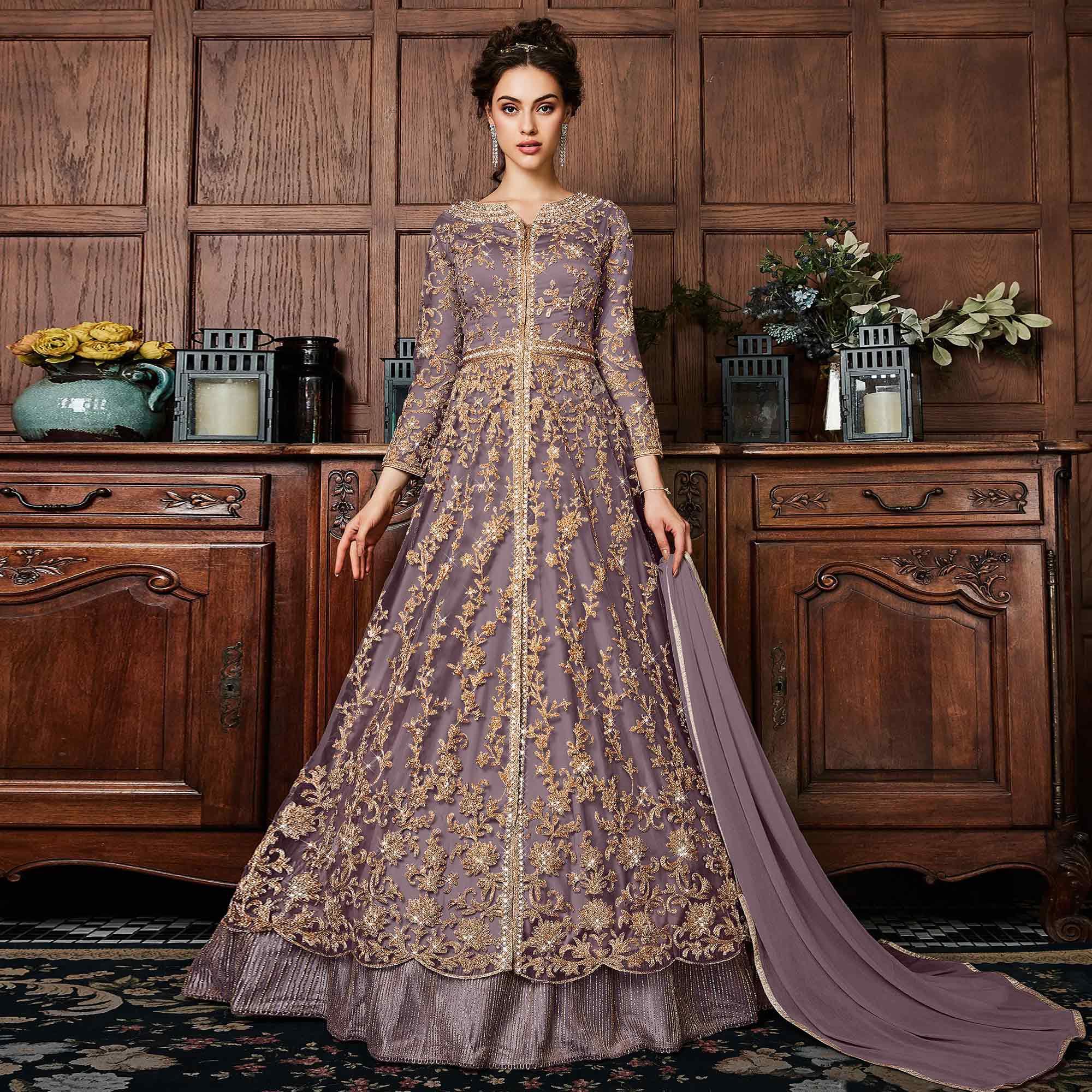 Desirable Dark Mauve Colored Partywear Embroidered Netted Anarkali Suit - Peachmode