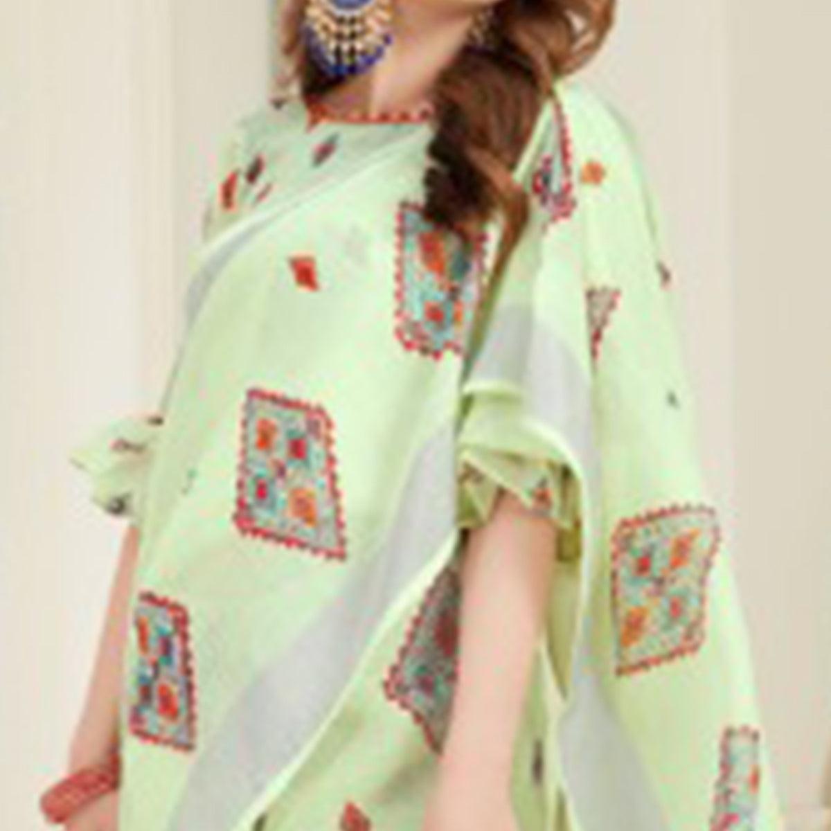 Desirable Light Green Colored Casual Printed Linen Saree With Tassels - Peachmode