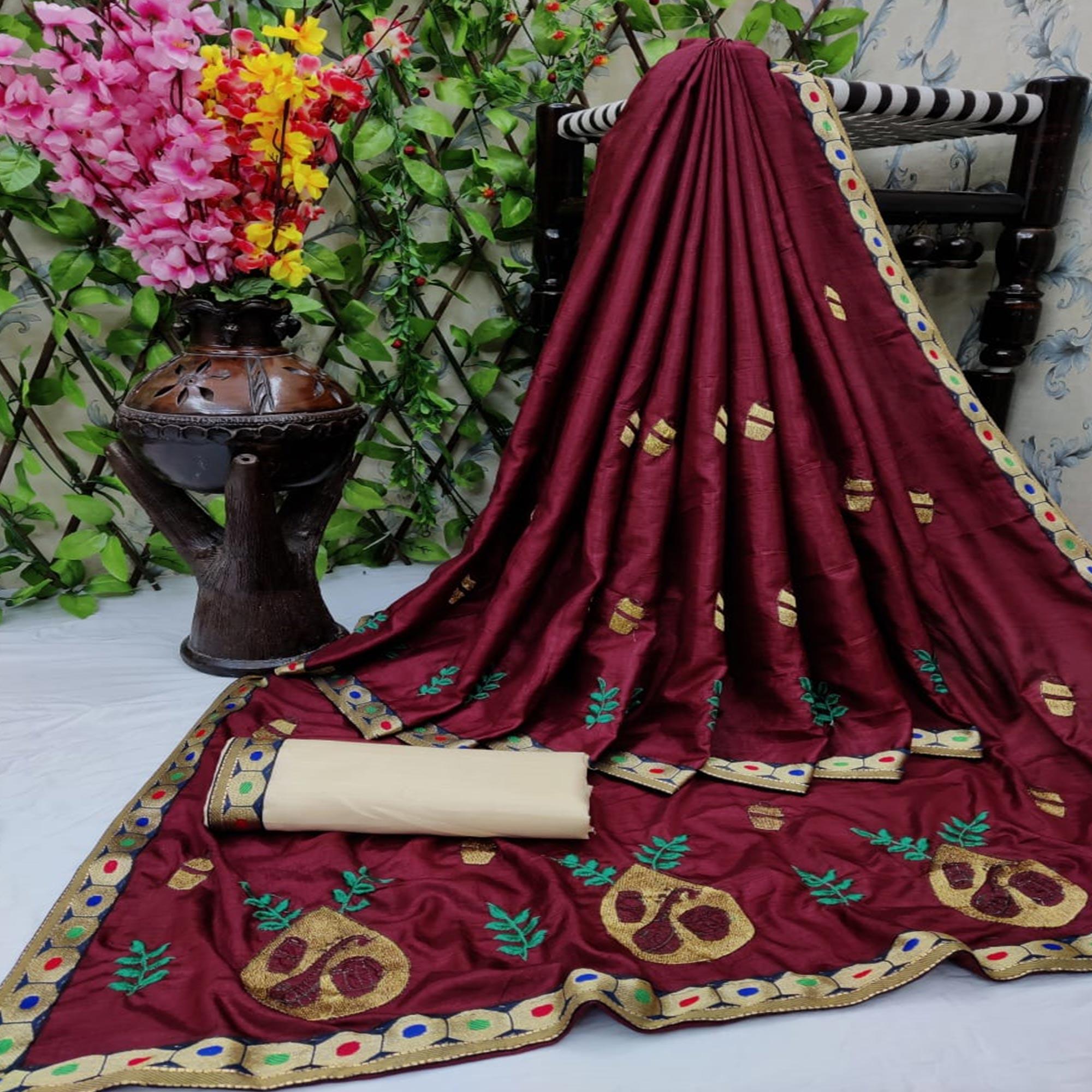 Desirable Maroon Coloured Partywear Embroidered Dola Silk Saree - Peachmode
