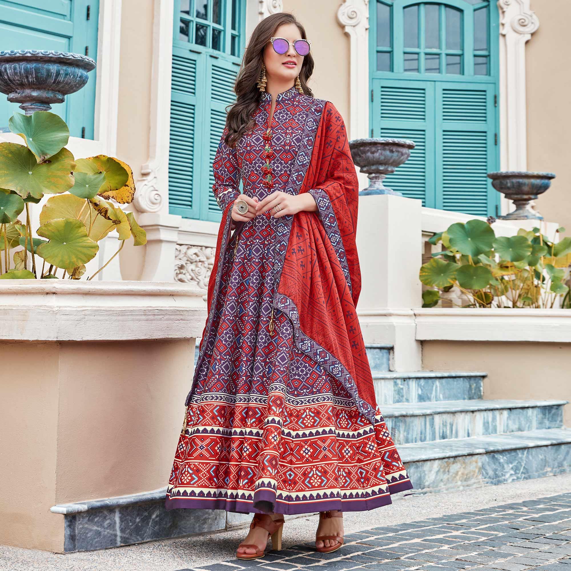 Elegant Blue Colored Partywear Patola Printed Silk Anarkali Suit - Peachmode
