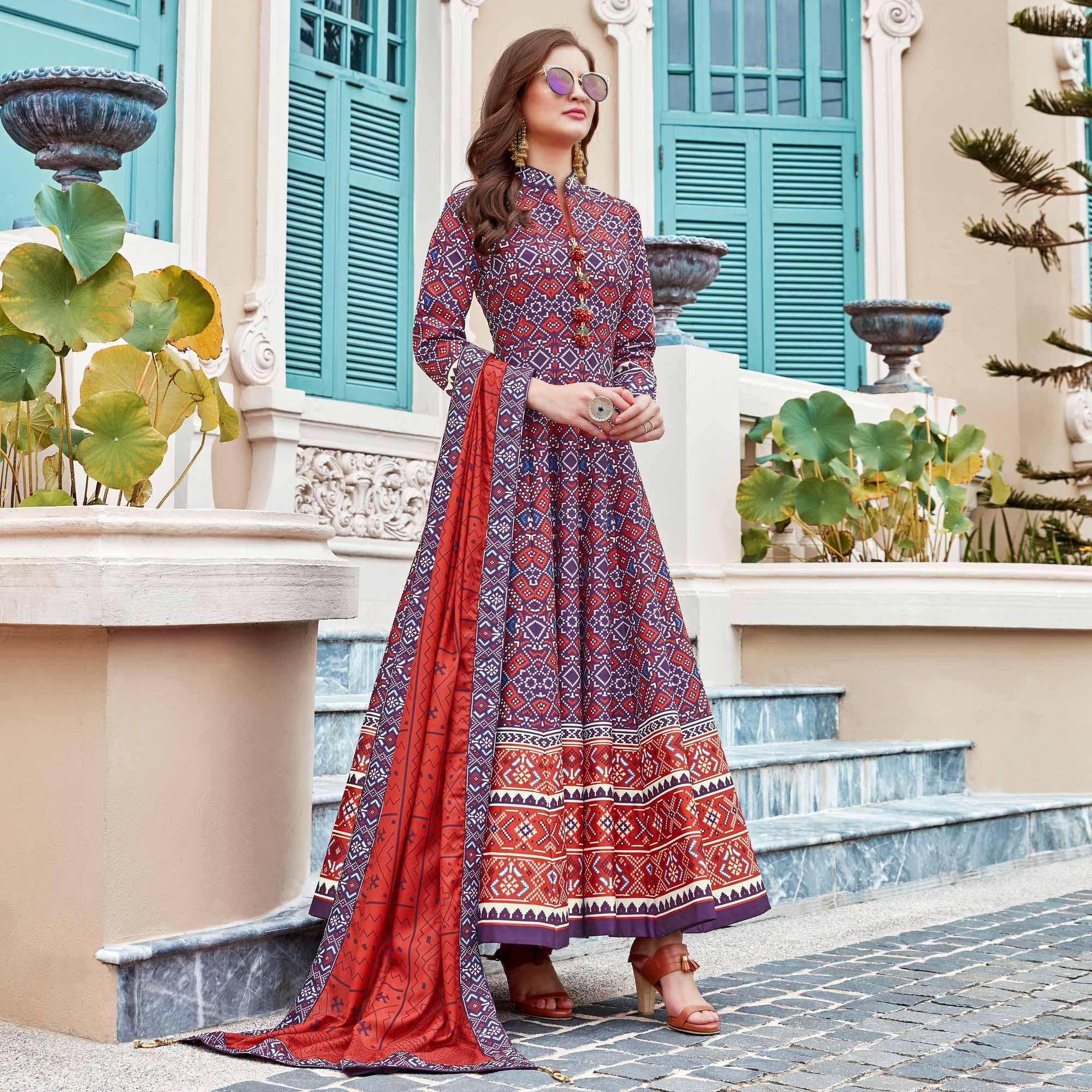 Elegant Blue Colored Partywear Patola Printed Silk Anarkali Suit - Peachmode