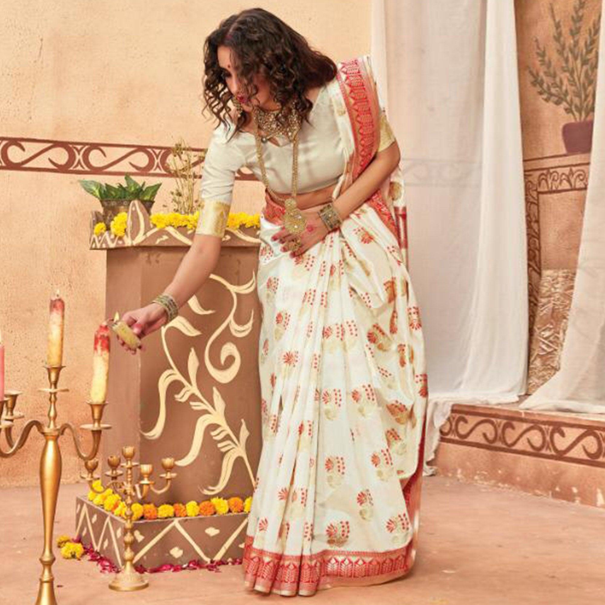 Elegant Cream Colored Festive Wear Woven Silk Blend Saree With Tassels - Peachmode