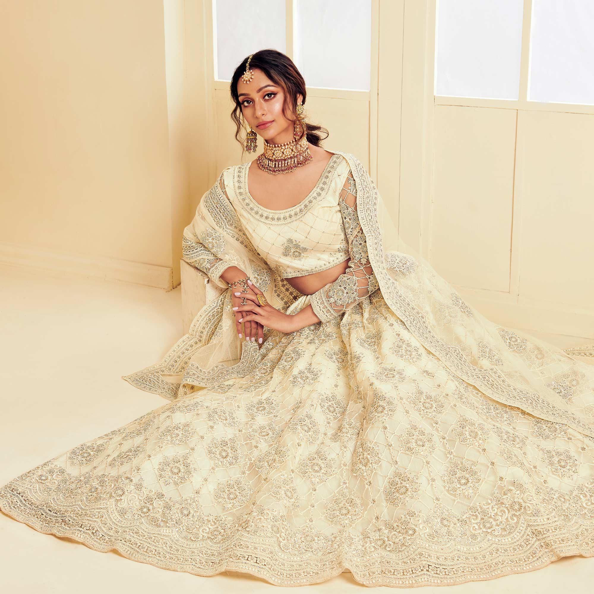 Elegant Off White Coloured Wedding Wear Cording Embroidered Net Lehenga Choli - Peachmode