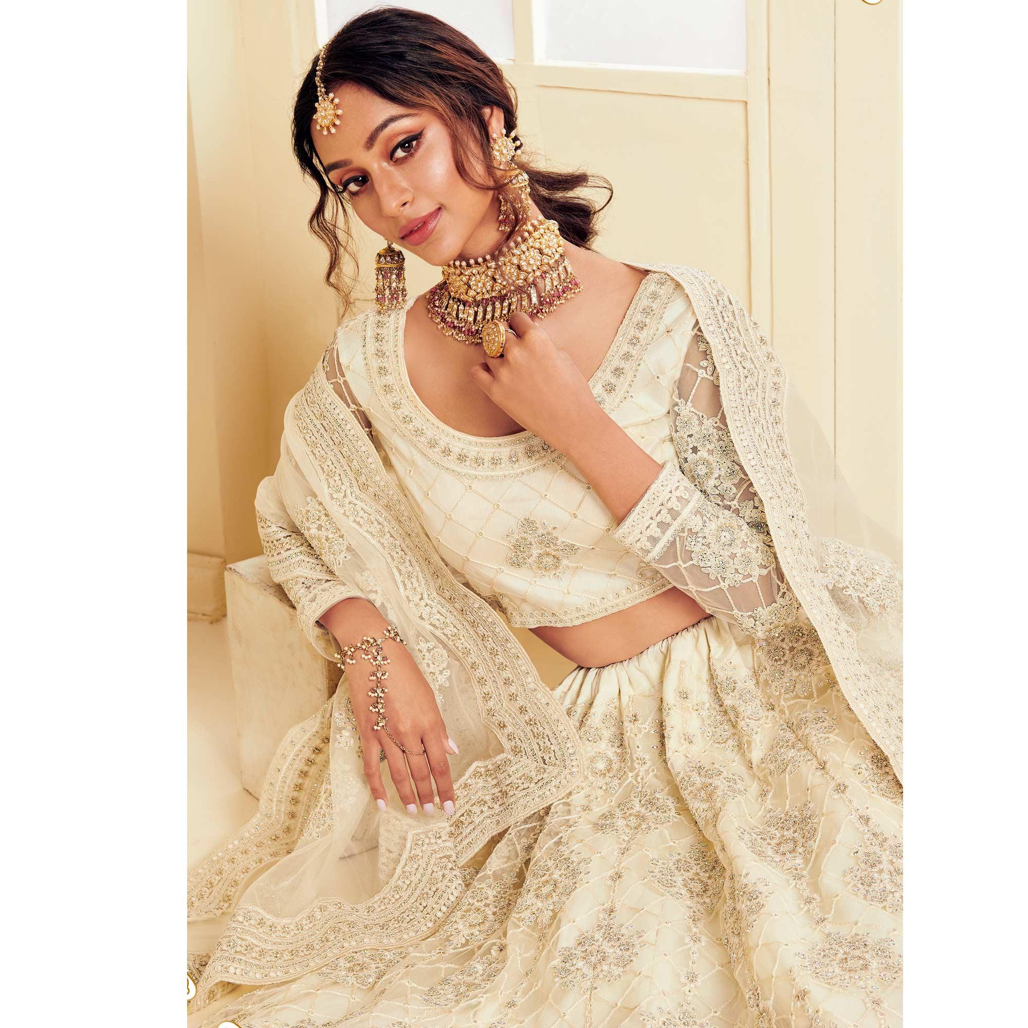 Elegant Off White Coloured Wedding Wear Cording Embroidered Net Lehenga Choli - Peachmode