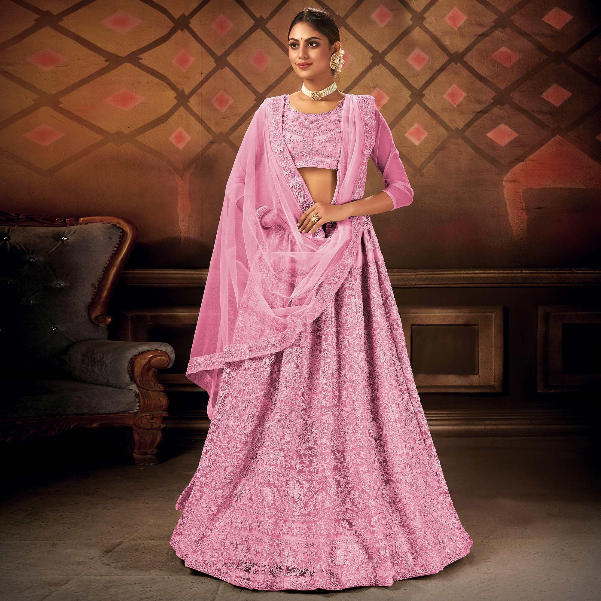 Energetic Pink Colored Partywear Embroidered Net Lehenga Choli - Peachmode