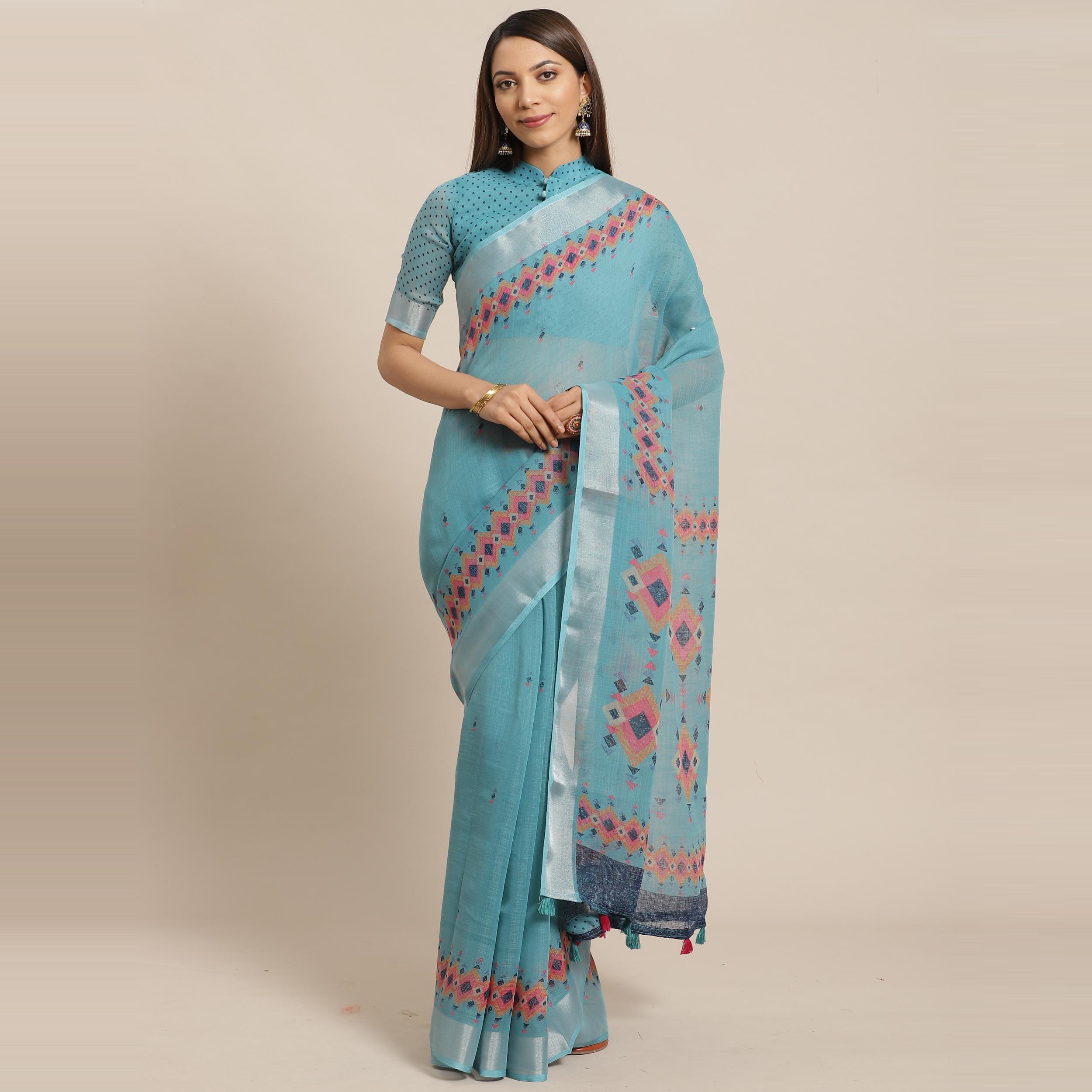 Energetic Teal Blue Colored Casual Wear Printed Linen Saree - Peachmode