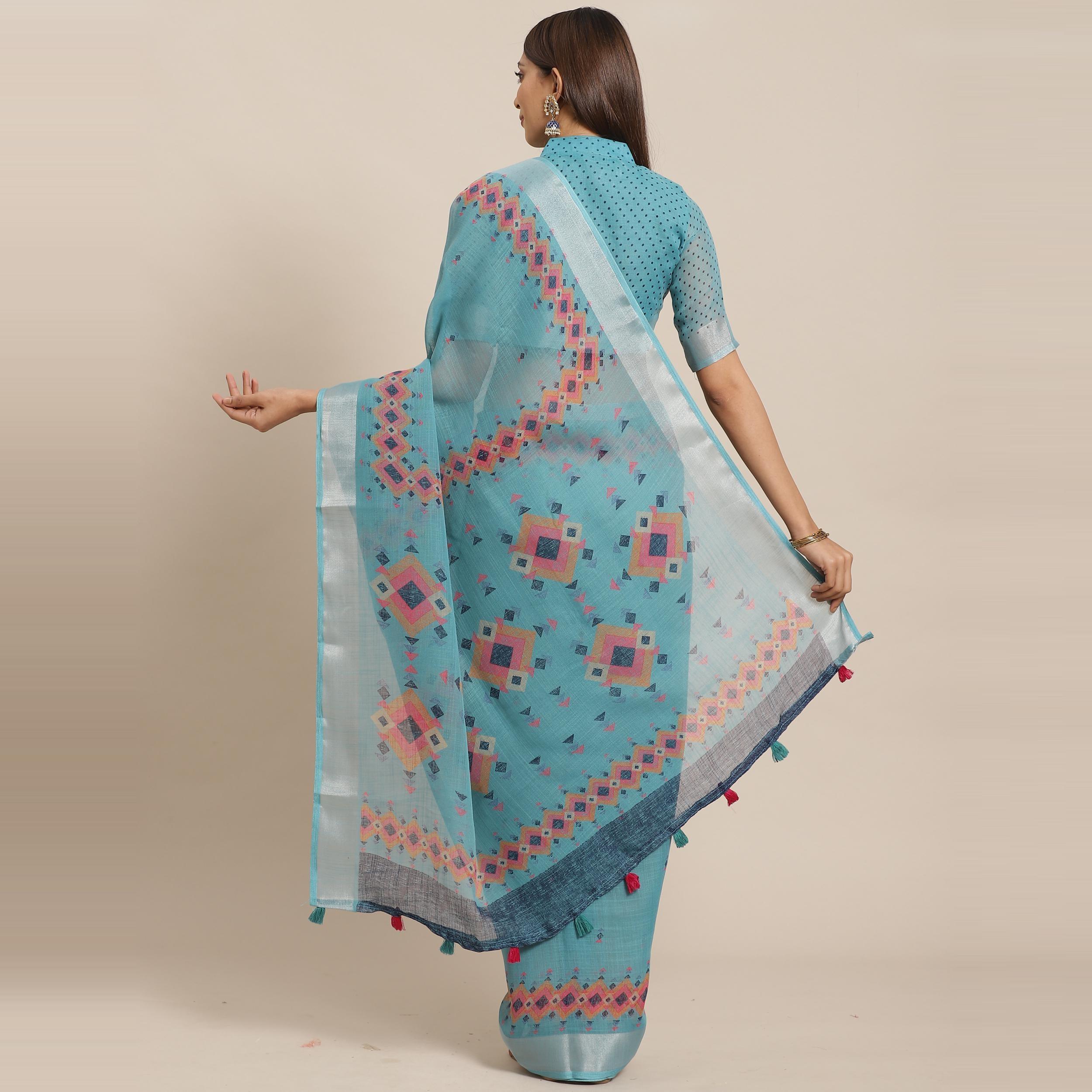 Energetic Teal Blue Colored Casual Wear Printed Linen Saree - Peachmode