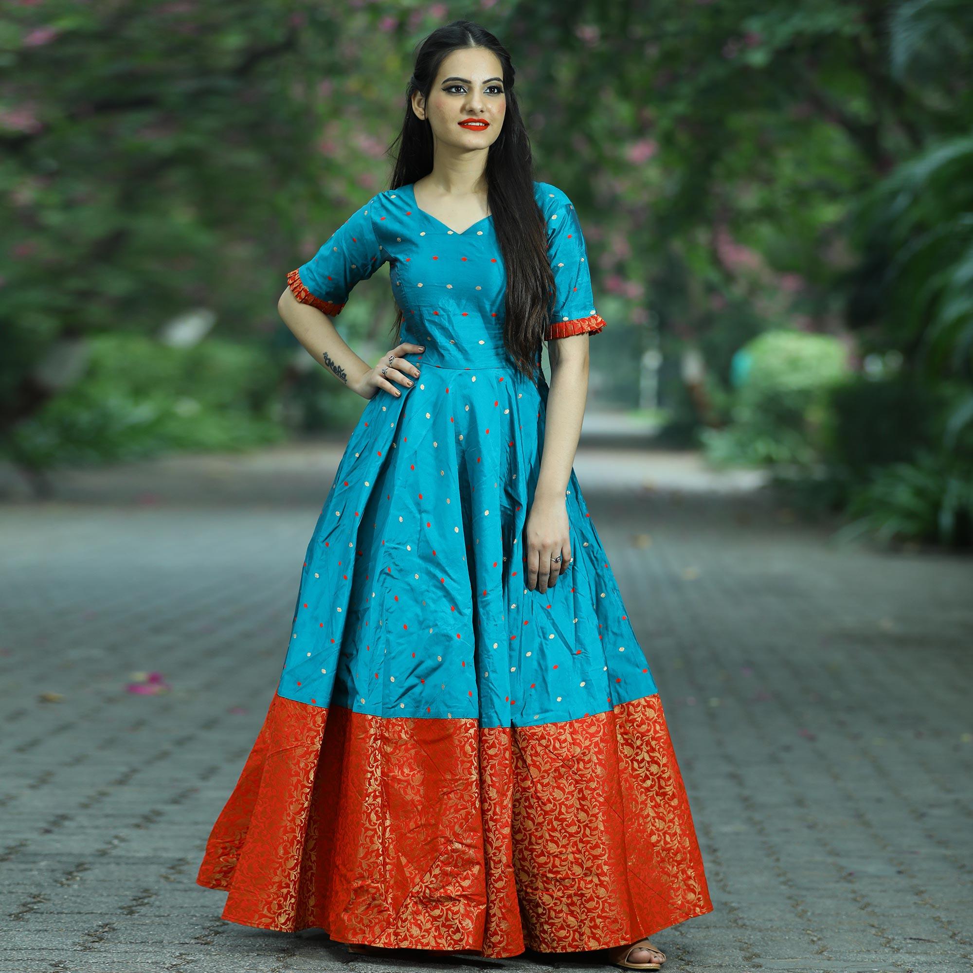 Energetic Teal Green Colored Partywear Tapetta Jacquard Gown - Peachmode