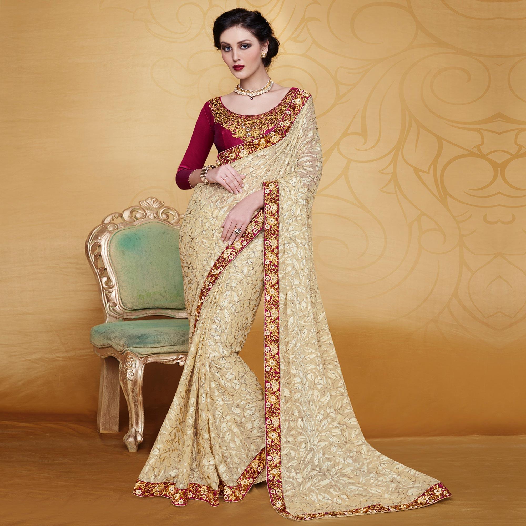 Engrossing Beige Colored Partywear Embroidered Brasso Saree - Peachmode