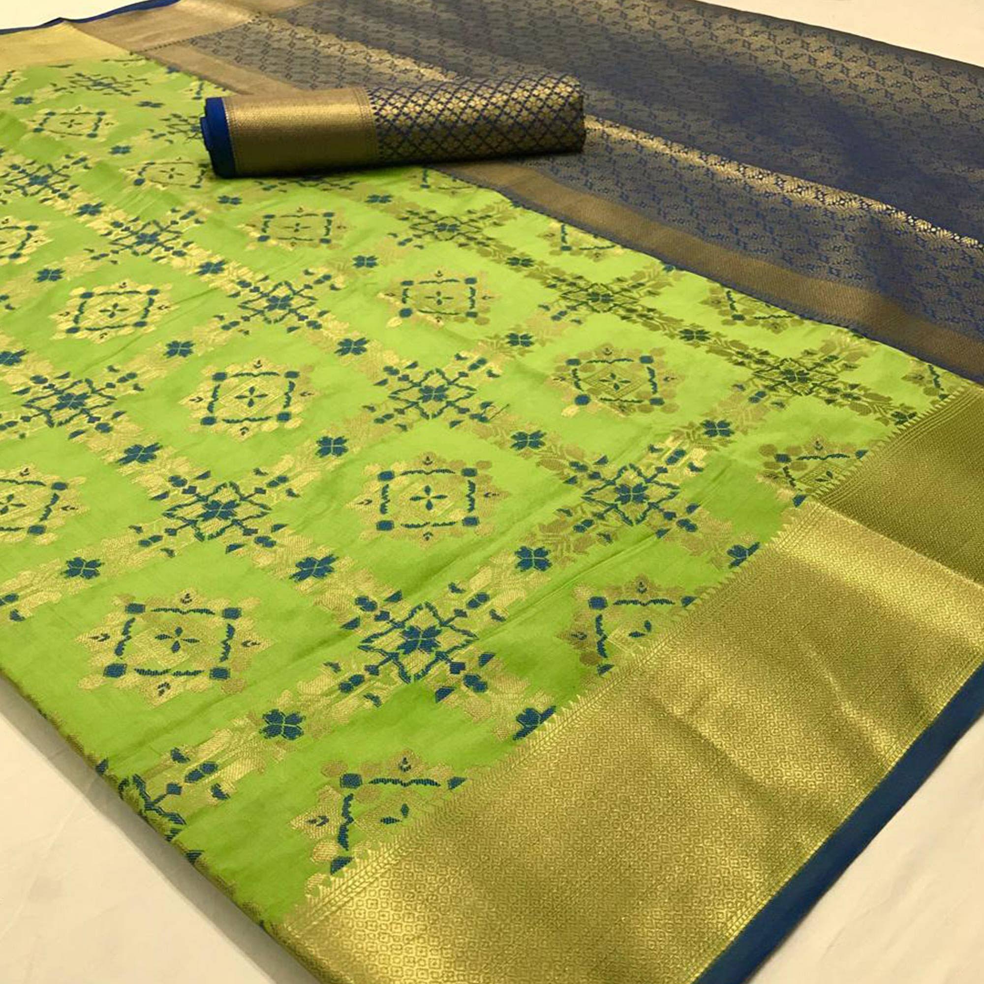 Engrossing Green Colored Festive Wear Woven Silk Saree - Peachmode