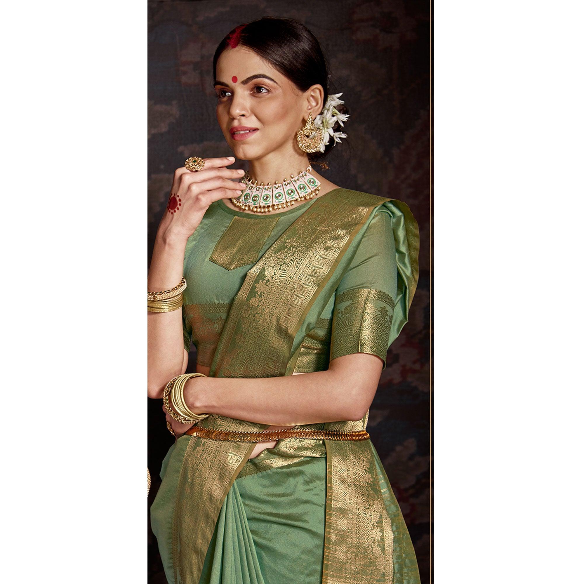 Engrossing Light Green Colored Festive Wear Woven Silk Saree - Peachmode