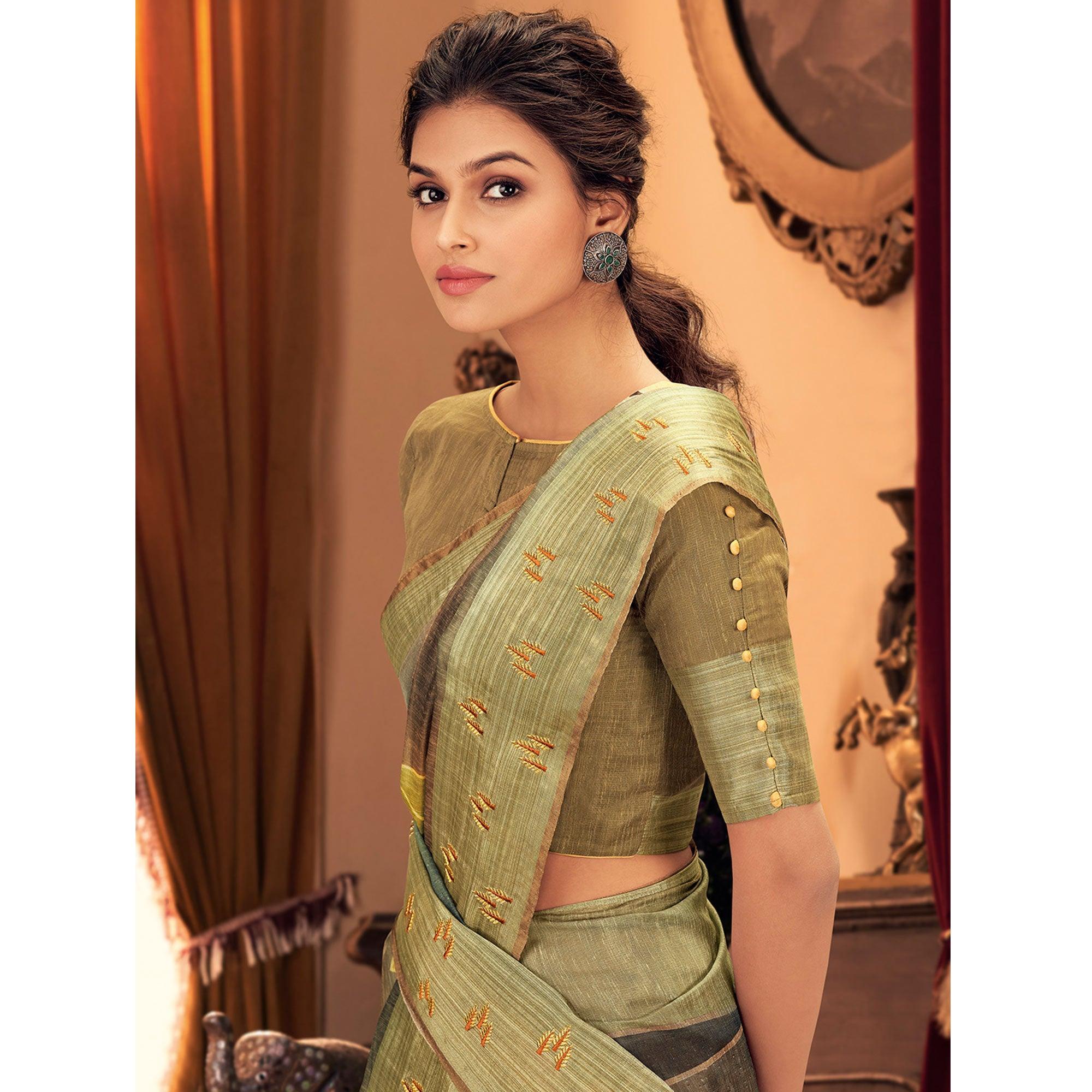 Engrossing Mehndi Green Colored Festive Wear Printed And Woven Border Silk Saree - Peachmode
